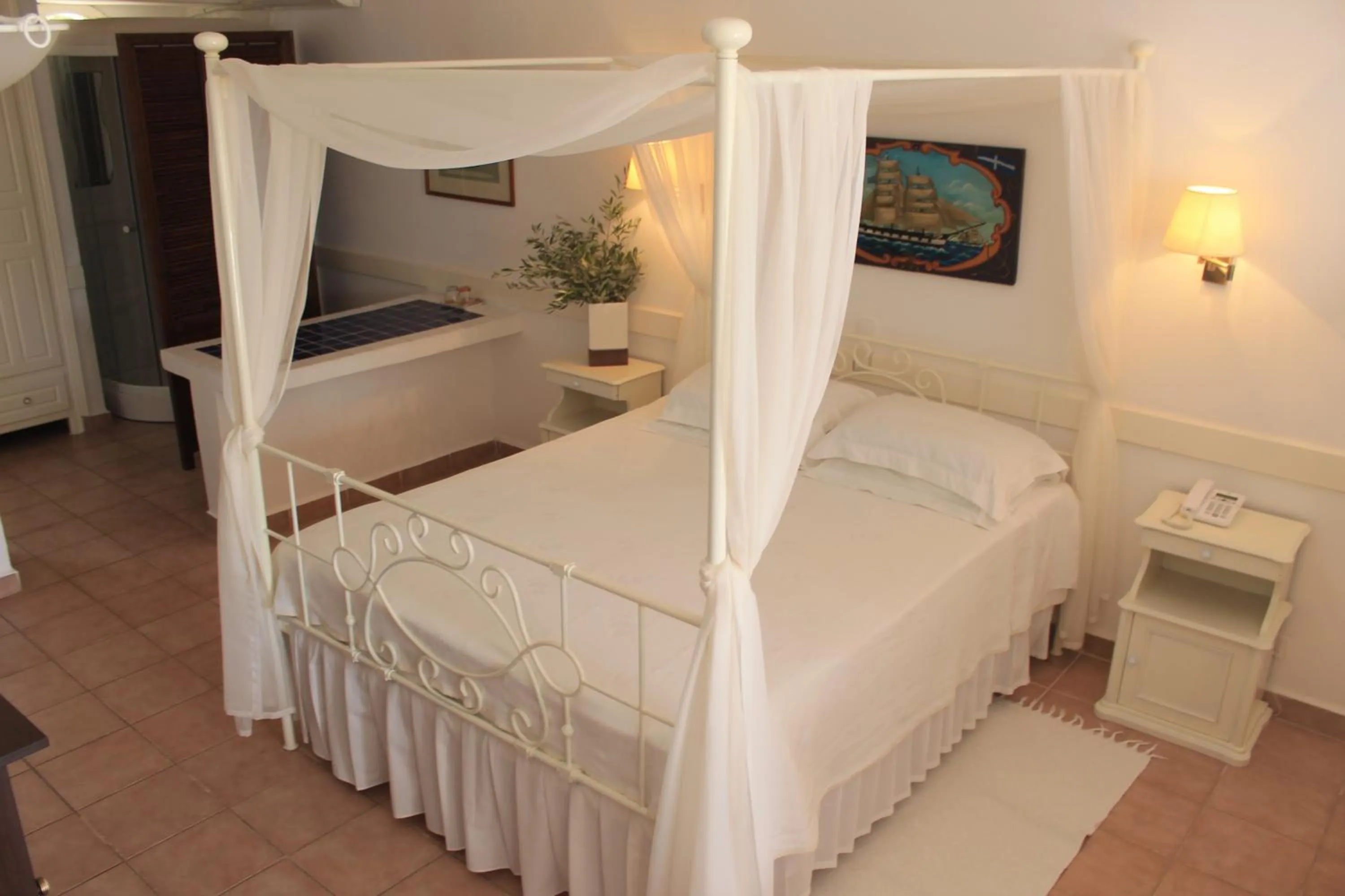 Bed in Porto Scoutari Romantic Hotel