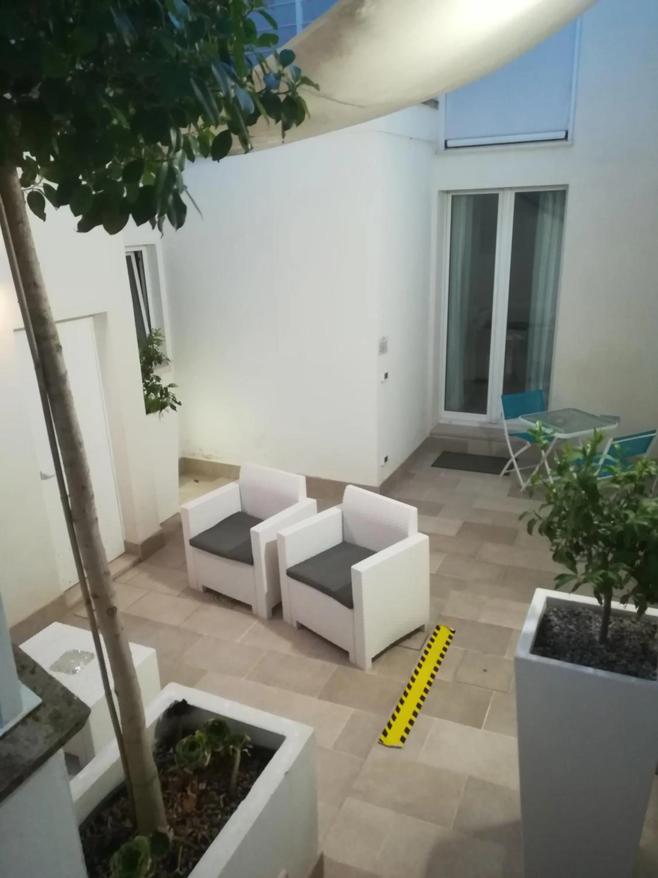 Patio in Y Arcillos Luxury Rooms CIN ITO75O35B4OOO468O2