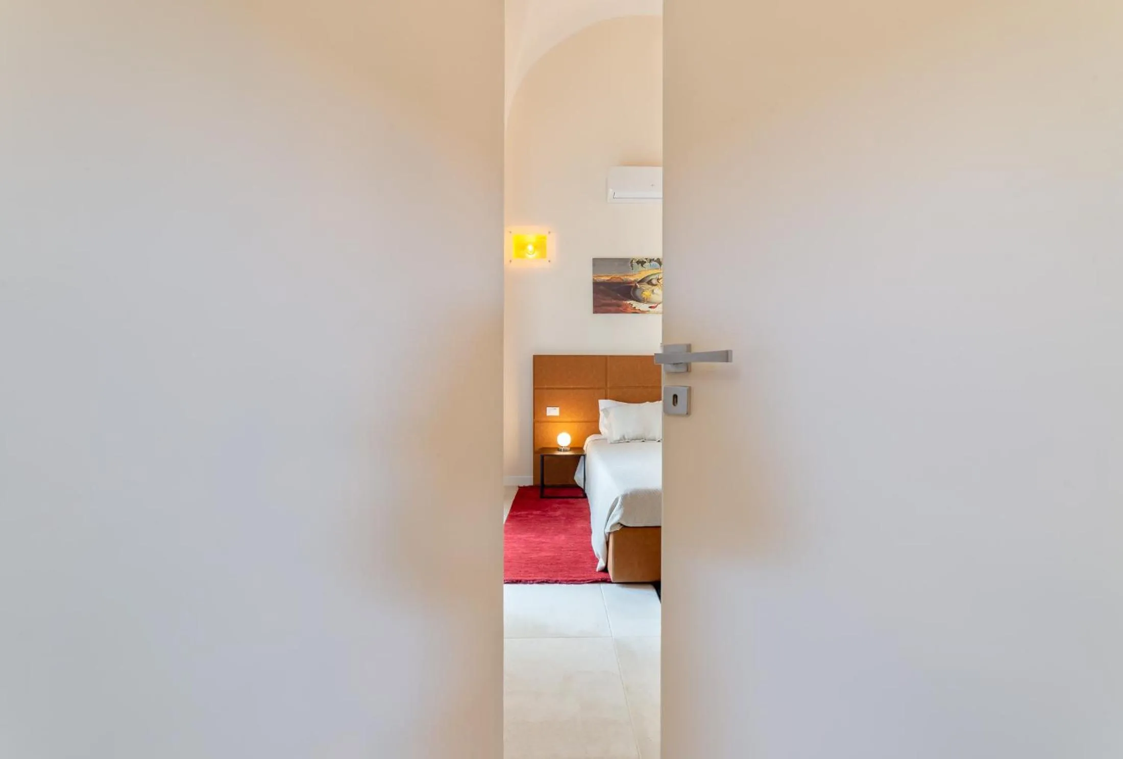 Bed in Y Arcillos Luxury Rooms CIN ITO75O35B4OOO468O2