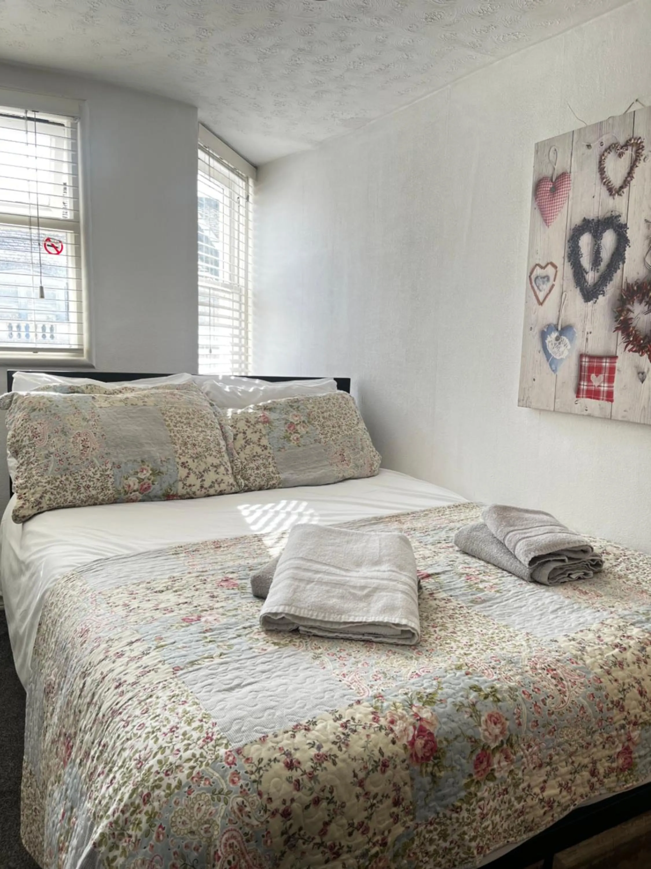 Bed in Relax Inn Guest House