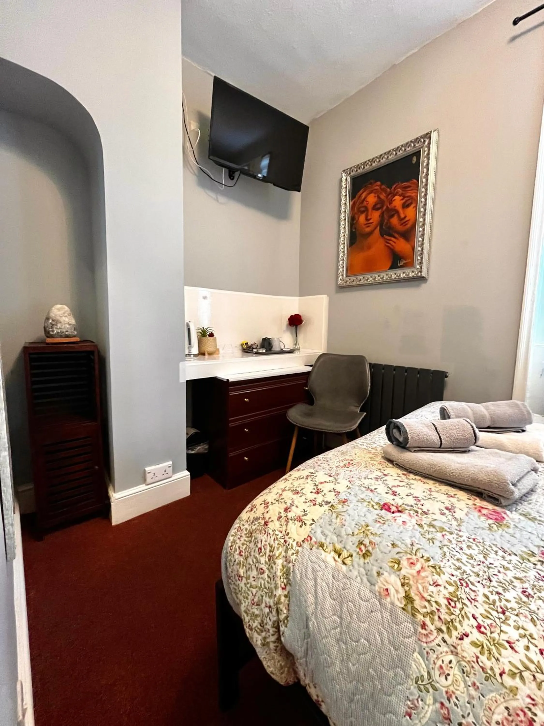 Bed in Relax Inn Guest House