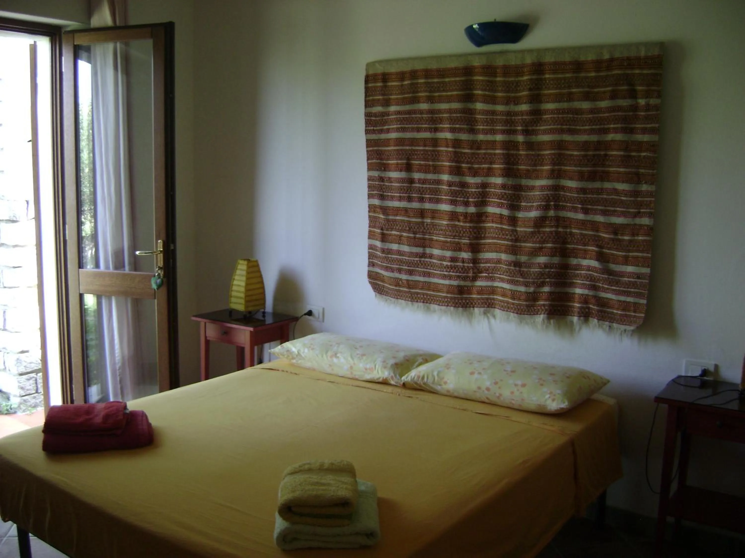 Bed in Hotel Sandalyon