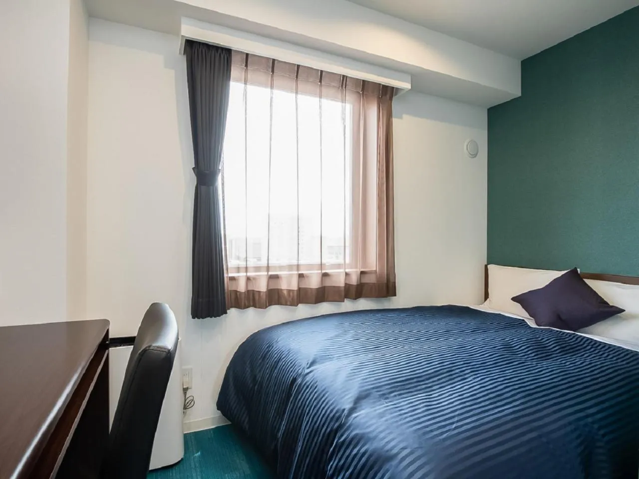 Bed in HOTEL LiVEMAX Gifu Ekimae