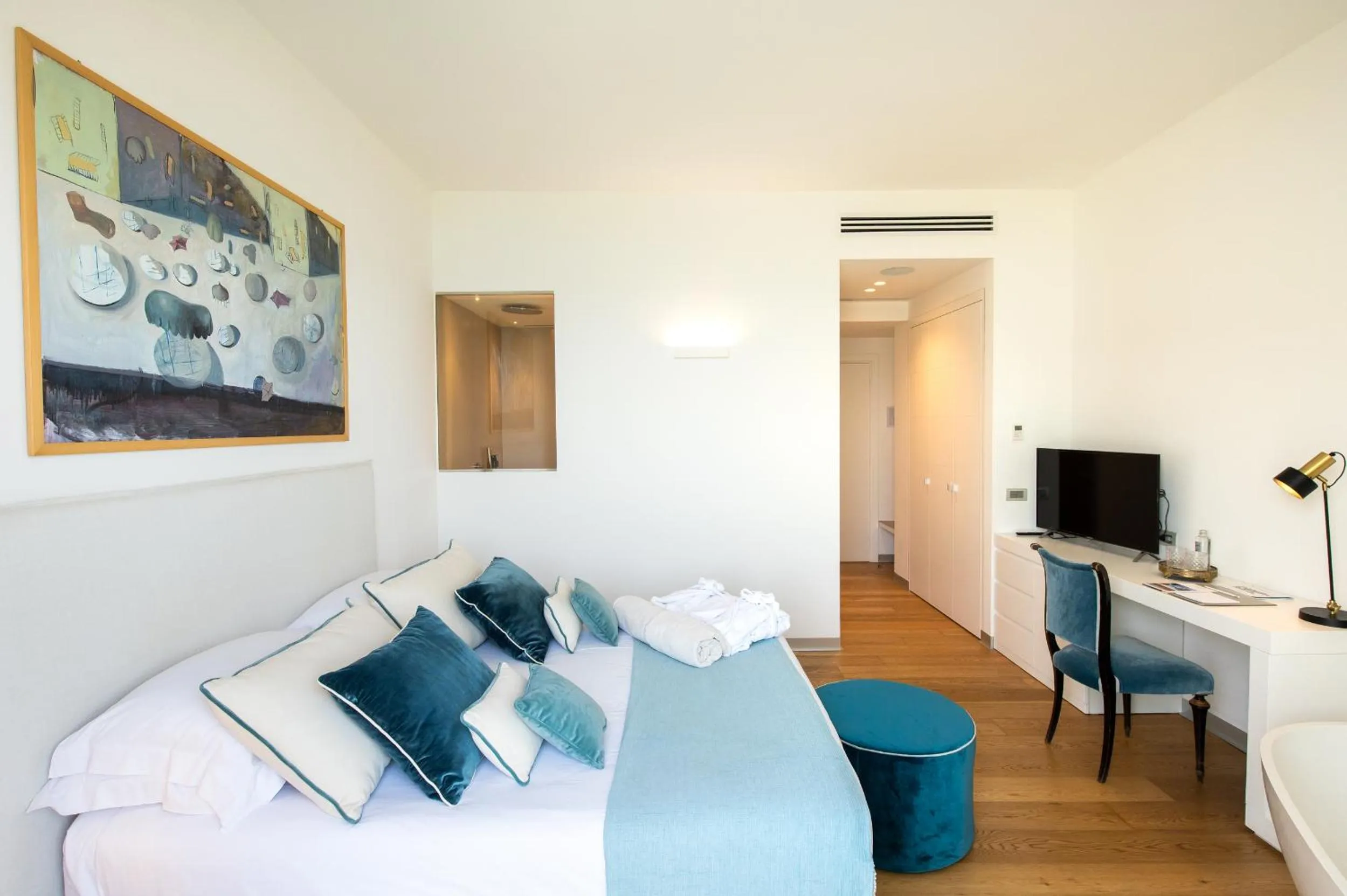 Bed in Unìco Boutique Hotel d'Arte