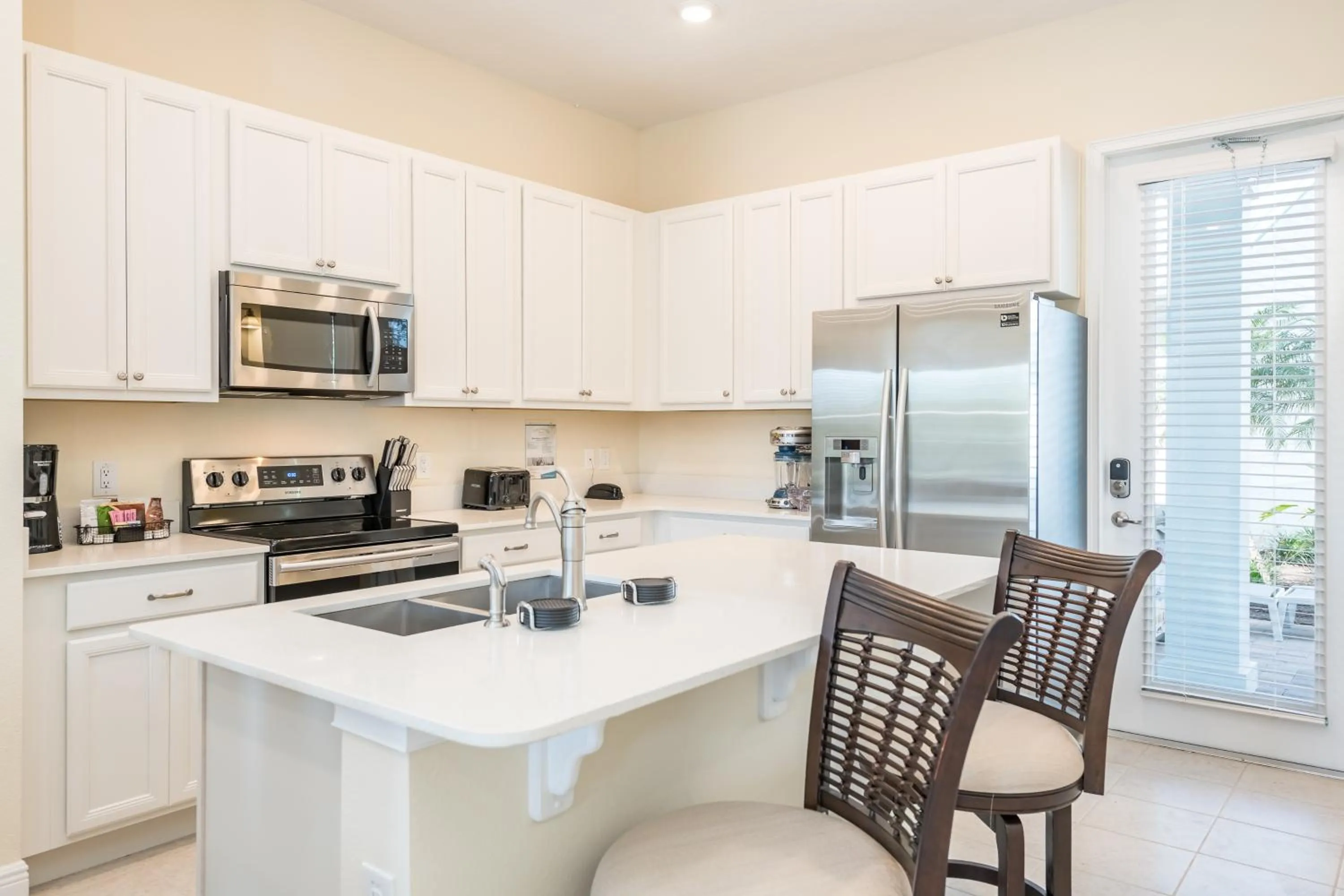 Kitchen or kitchenette in Margaritaville Cottages Orlando by Rentyl with H2O Waterpark