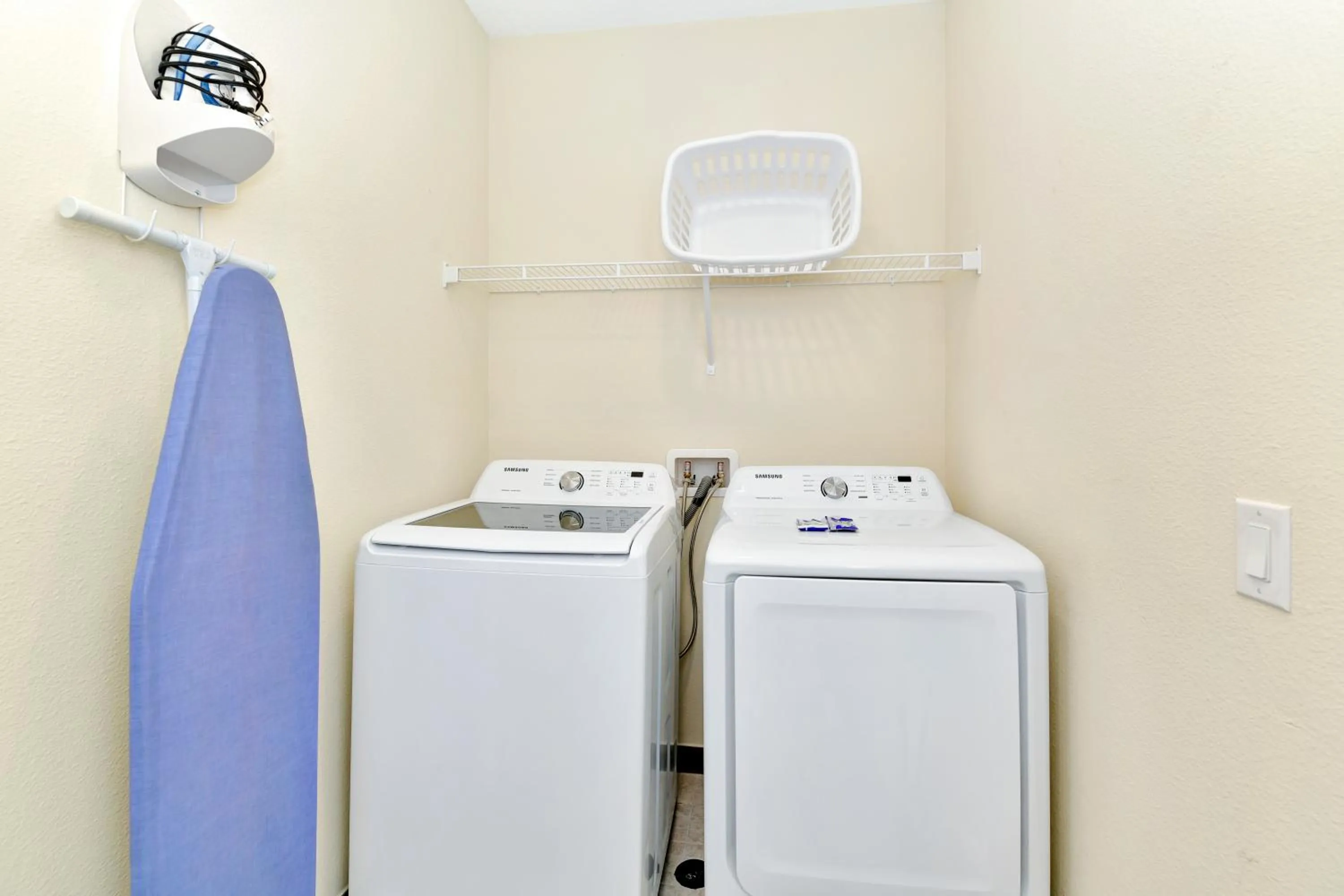 washing machine in Margaritaville Cottages Orlando by Rentyl with H2O Waterpark