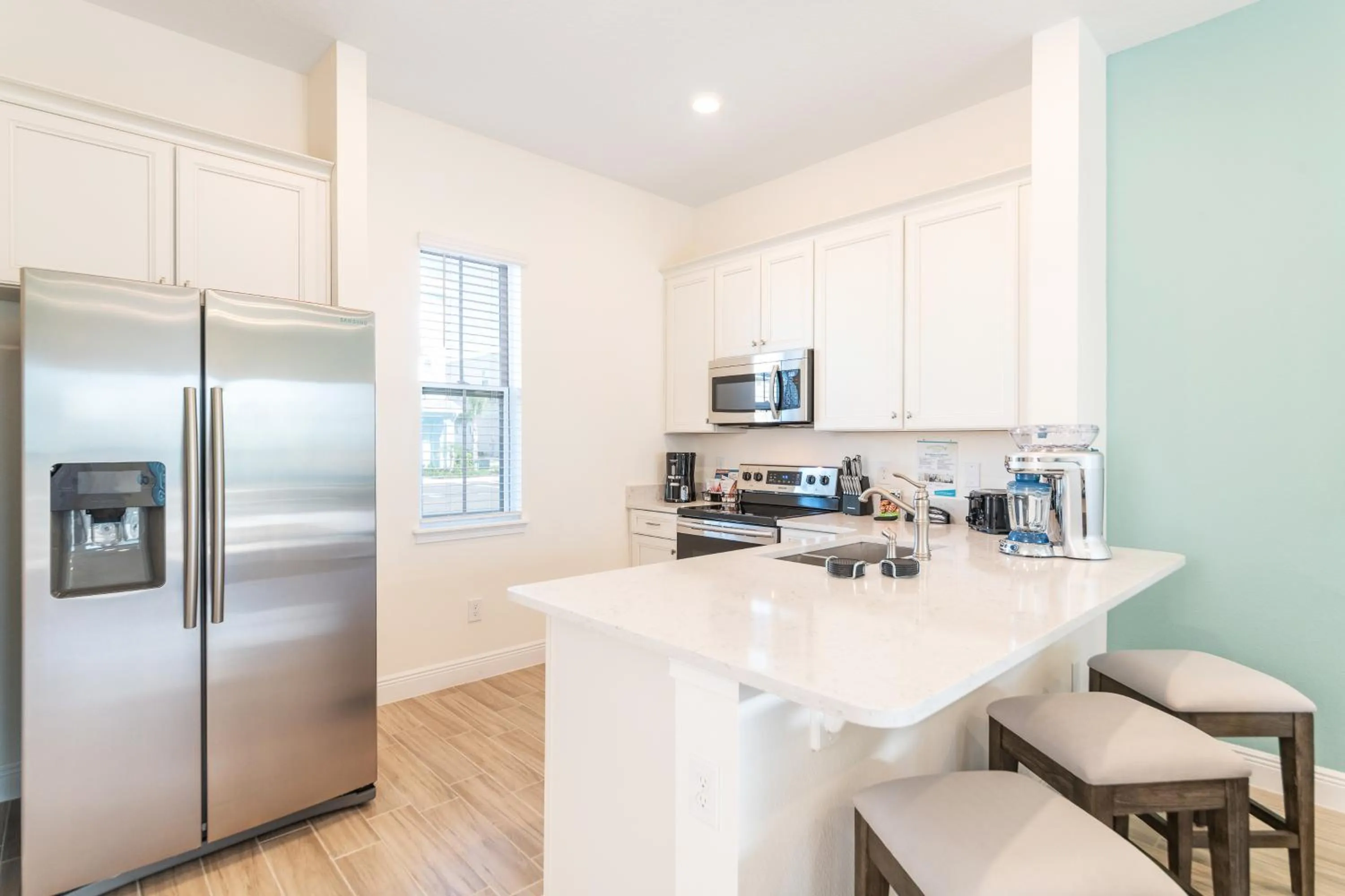 Kitchen or kitchenette in Margaritaville Cottages Orlando by Rentyl with H2O Waterpark