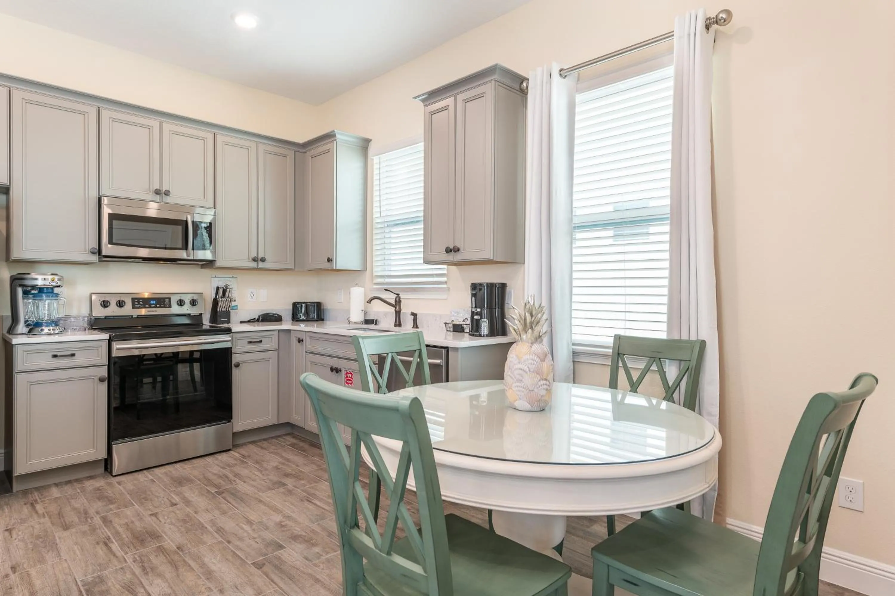 Kitchen or kitchenette in Margaritaville Cottages Orlando by Rentyl with H2O Waterpark