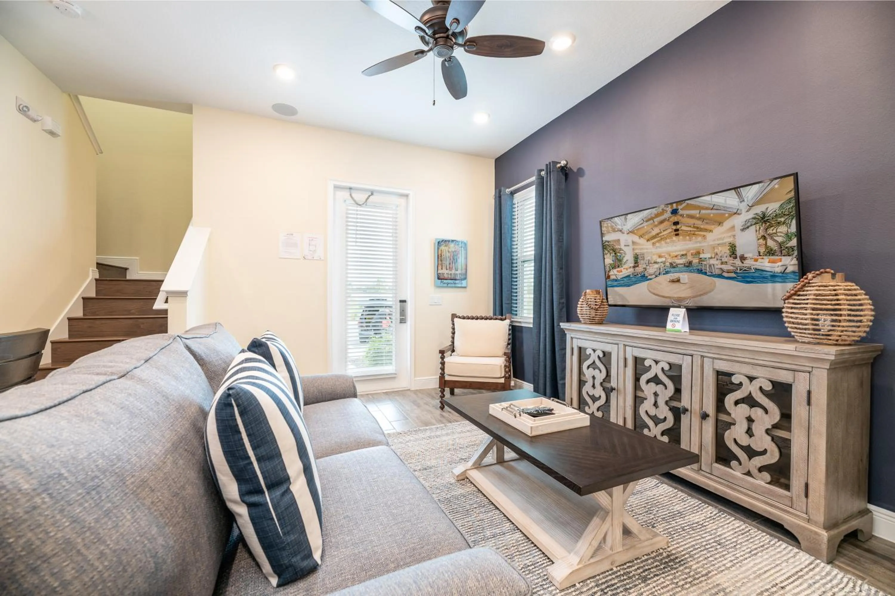 Living room in Margaritaville Cottages Orlando by Rentyl with H2O Waterpark