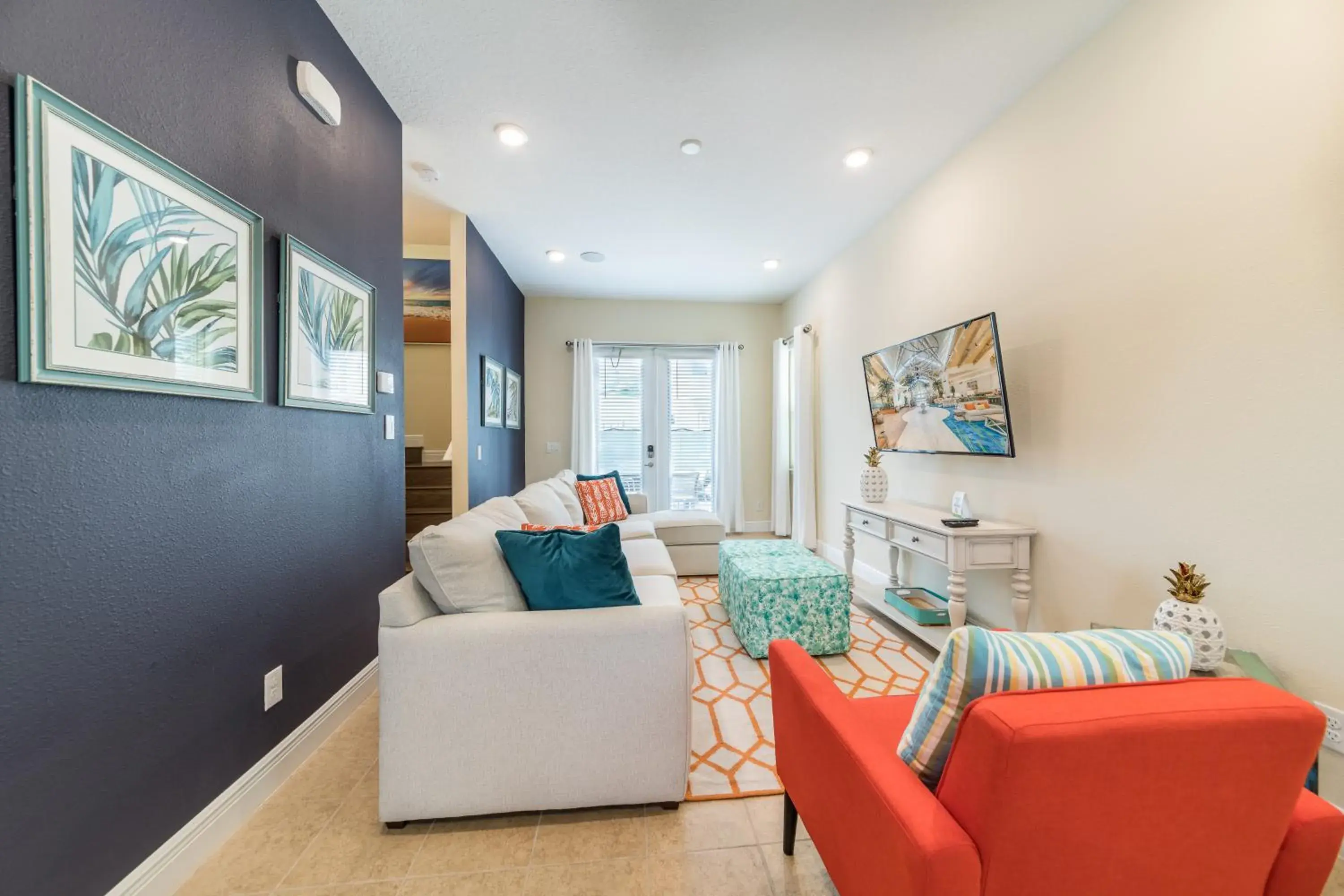 Living room in Margaritaville Cottages Orlando by Rentyl with H2O Waterpark Living room in Margaritaville Cottages Orlando by Rentyl with H2O Waterpark