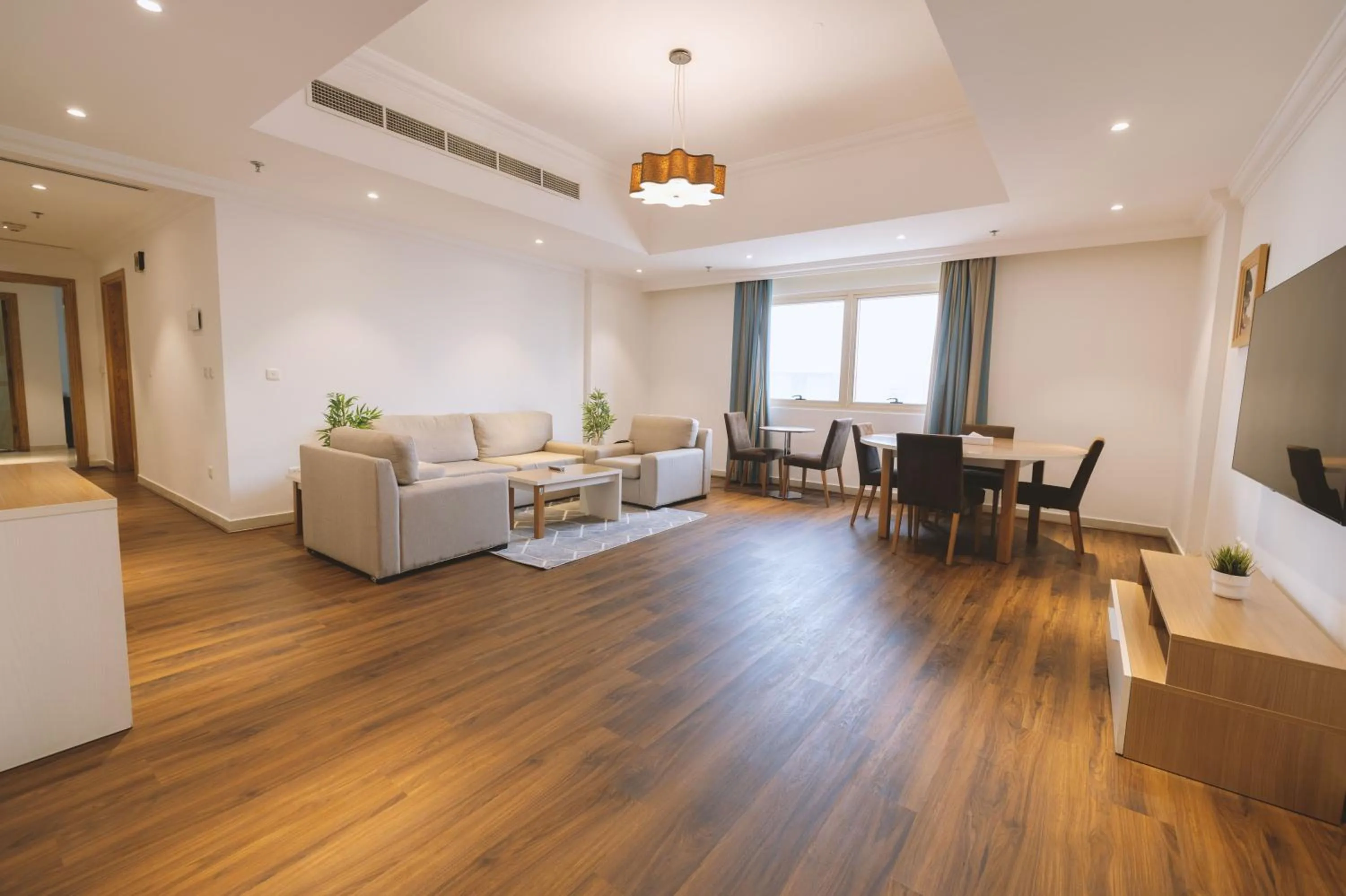 Living room in Magnum Hotel & Suites West Bay