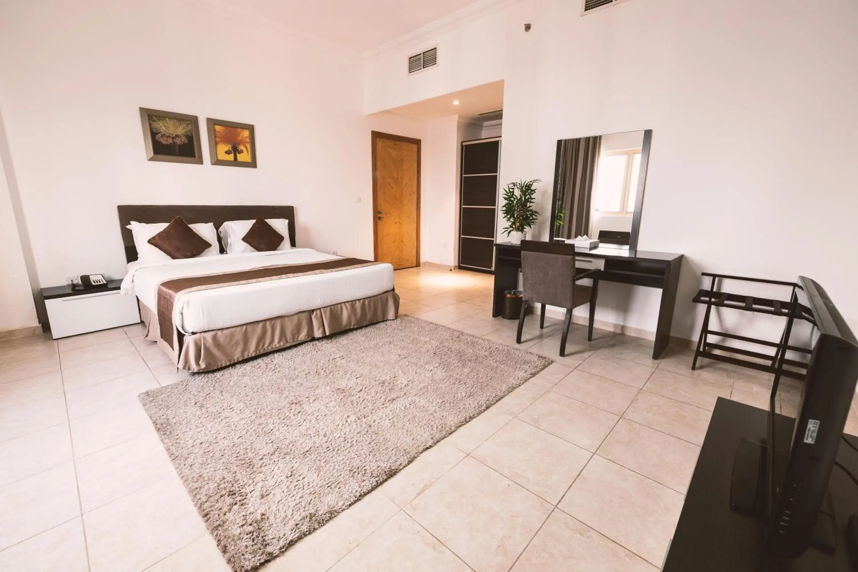 Two-Bedroom Suite in Magnum Hotel & Suites West Bay Two-Bedroom Suite in Magnum Hotel & Suites West Bay