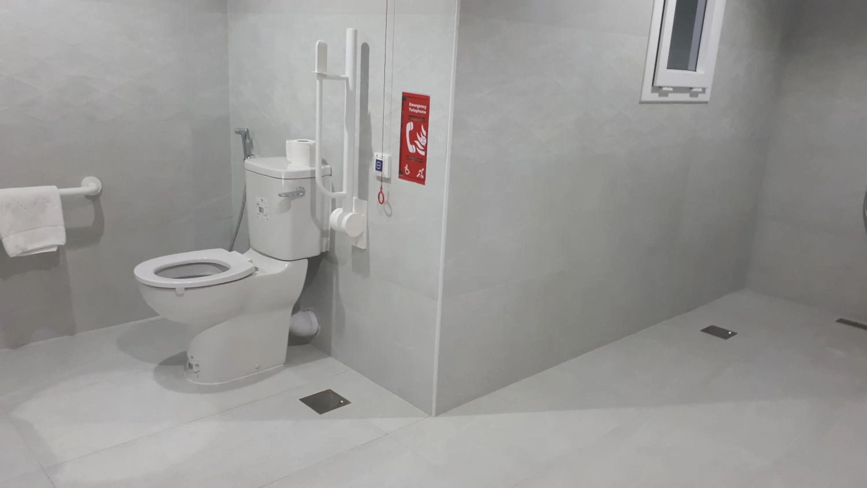 Bathroom in Magnum Hotel & Suites West Bay