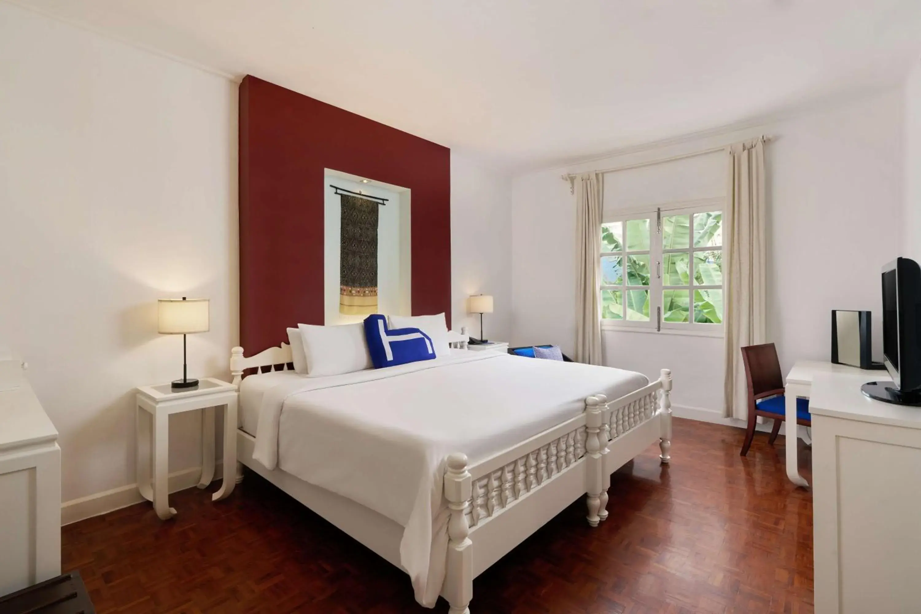 Bedroom, Bed in Homm Souvannaphoum Luang Prabang, part of Banyan Group Bedroom, Bed in Homm Souvannaphoum Luang Prabang, part of Banyan Group