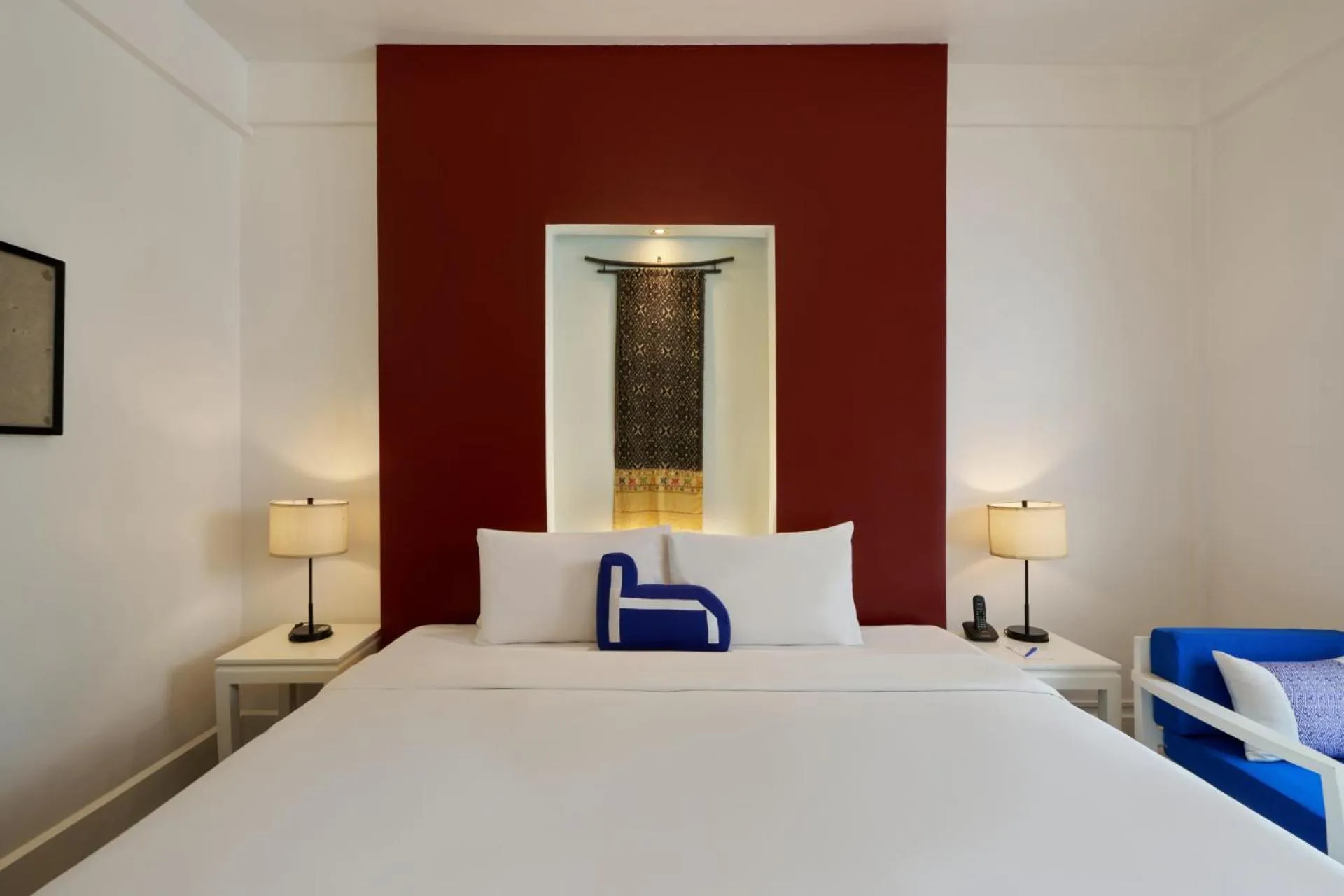 Bed in Homm Souvannaphoum Luang Prabang, part of Banyan Group