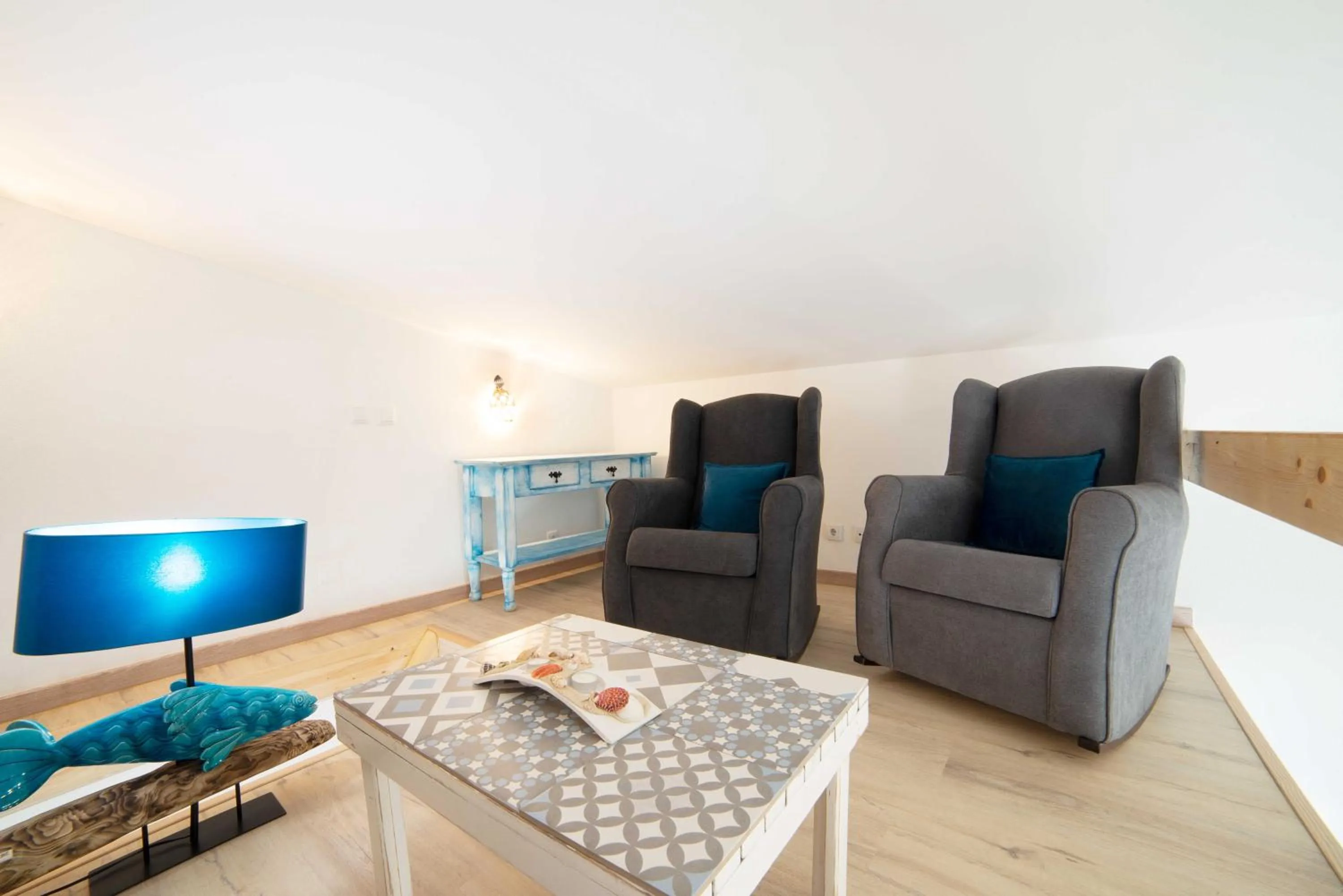 Seating area in O Quintal Guesthouse