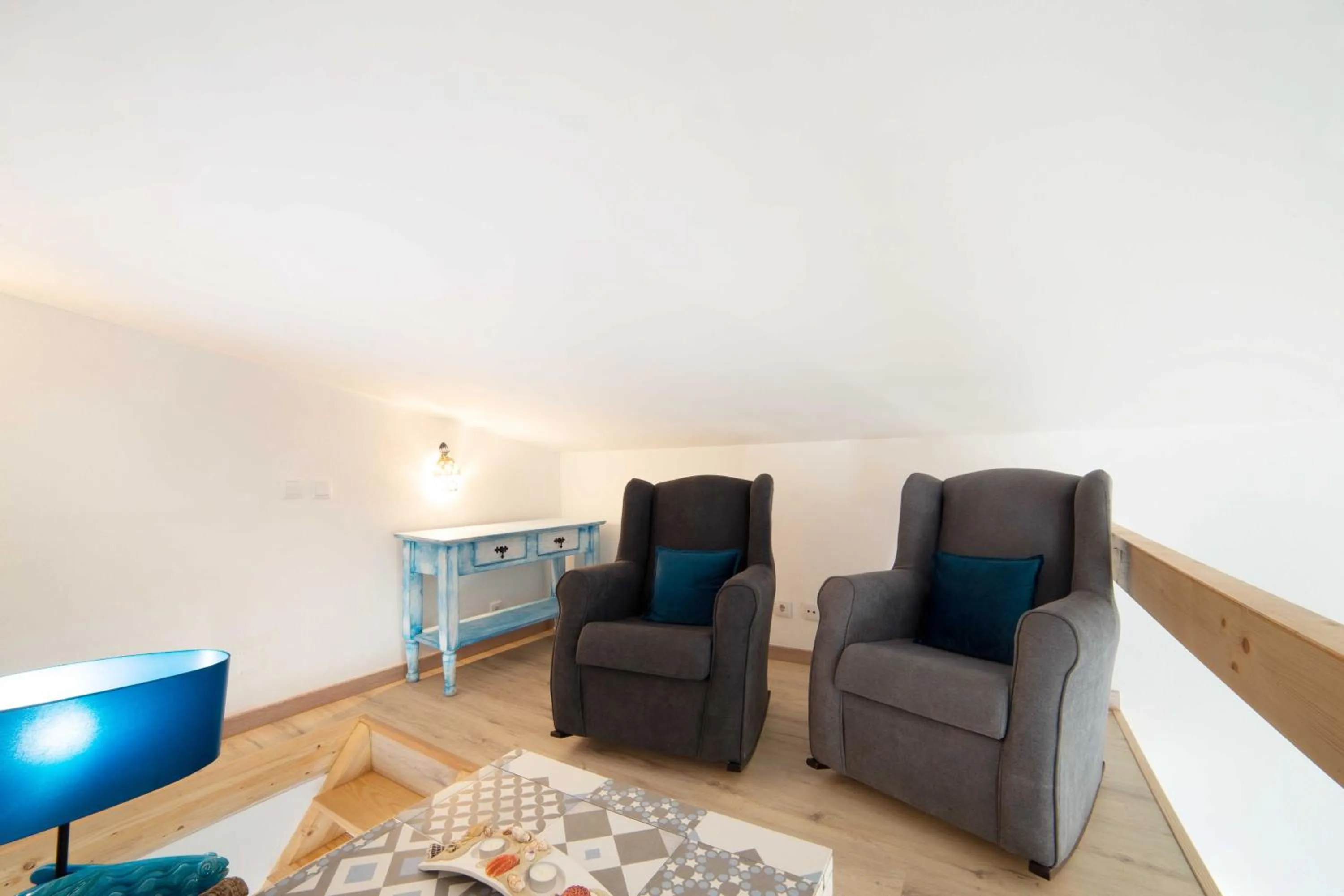 Seating area in O Quintal Guesthouse