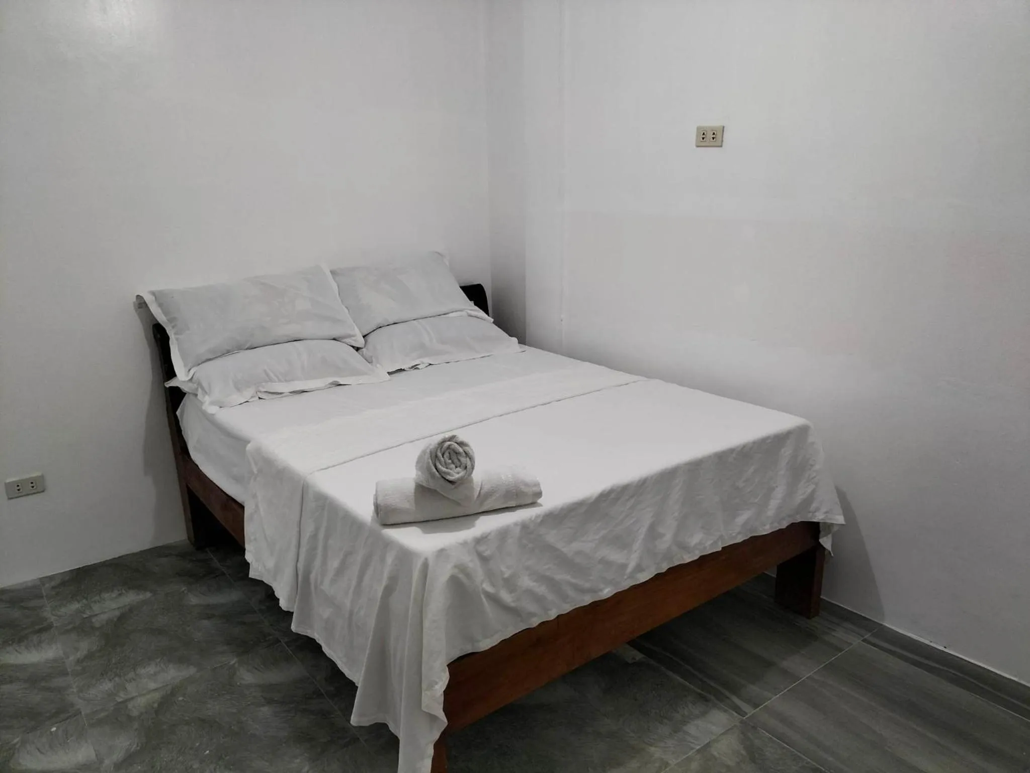 Bed in Mope Beach Resort