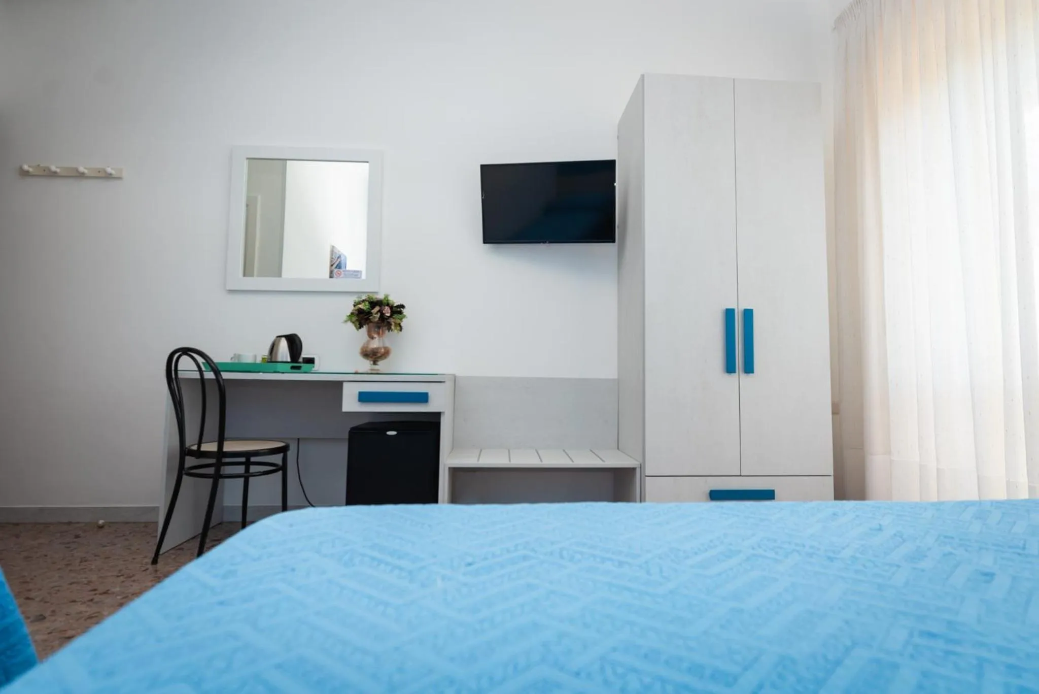 Bed in Hotel Baia Verde