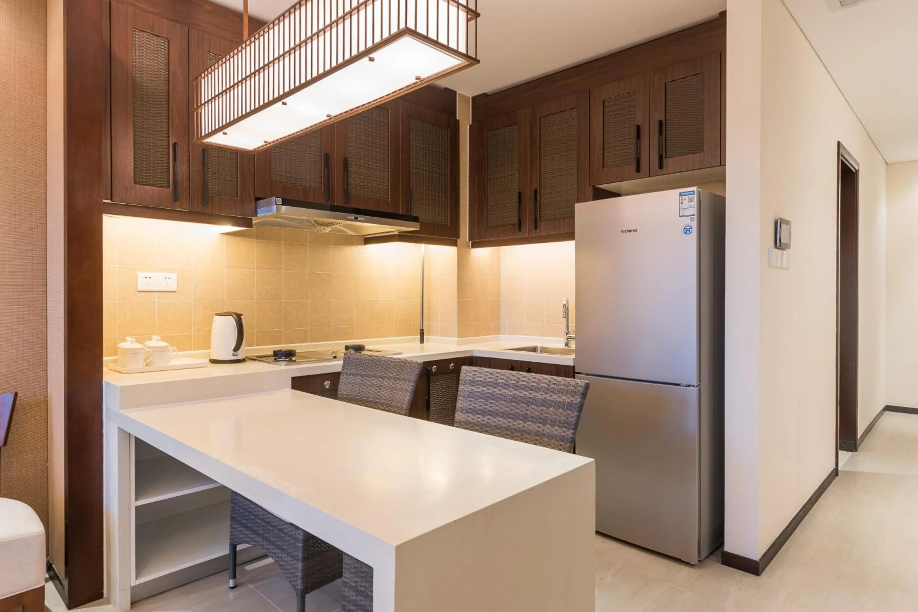 Kitchen or kitchenette in Sanya Haitang Bay Mushe Villa
