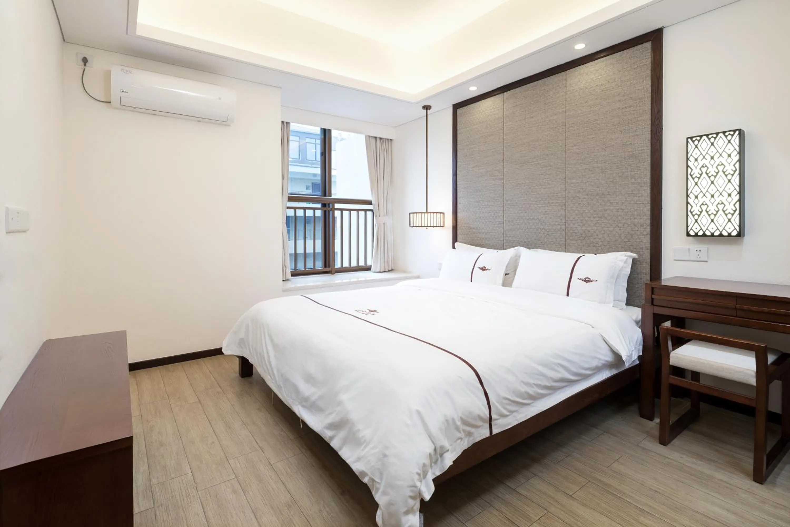 Bed in Sanya Haitang Bay Mushe Villa