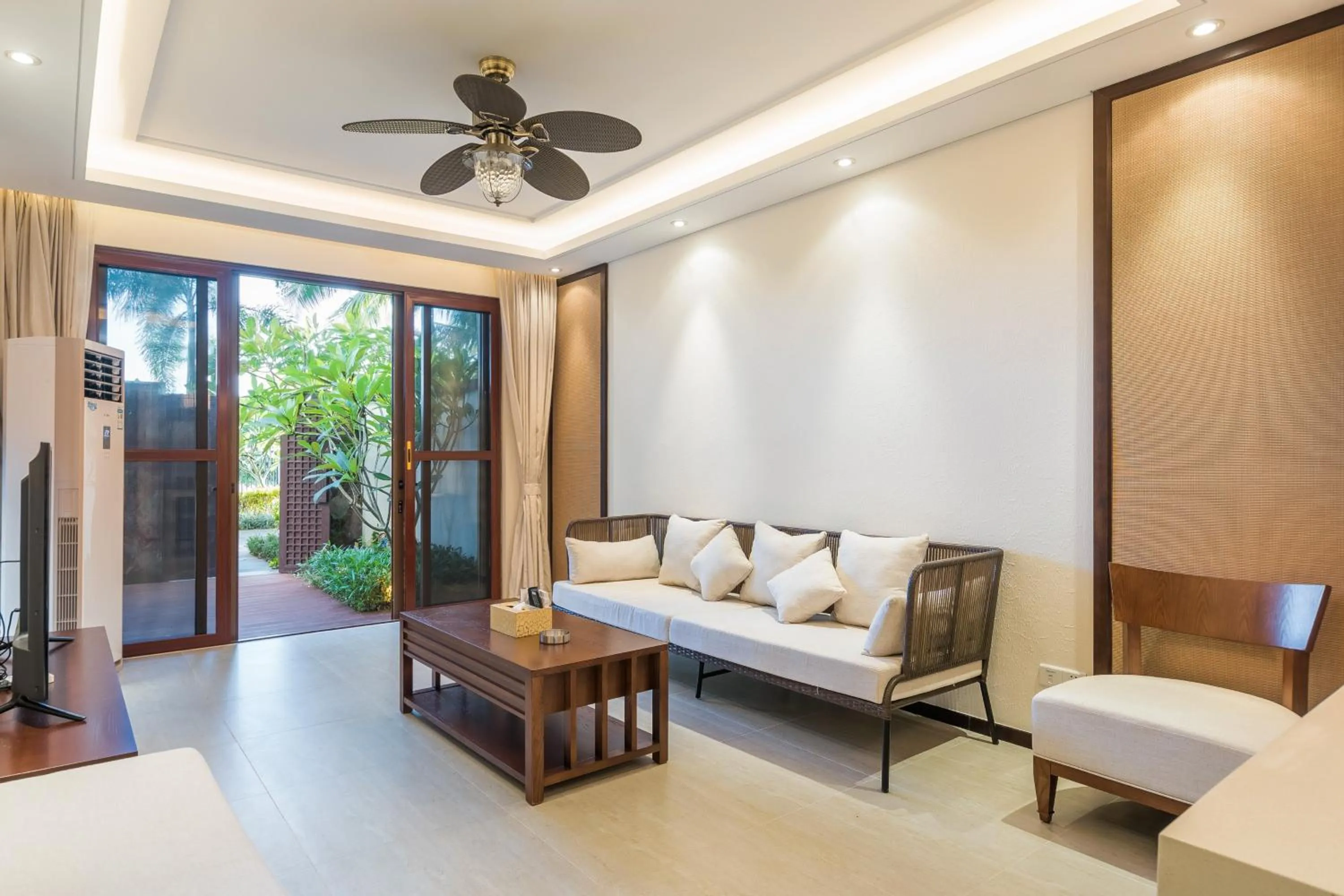 Living room, Bed in Sanya Haitang Bay Mushe Villa
