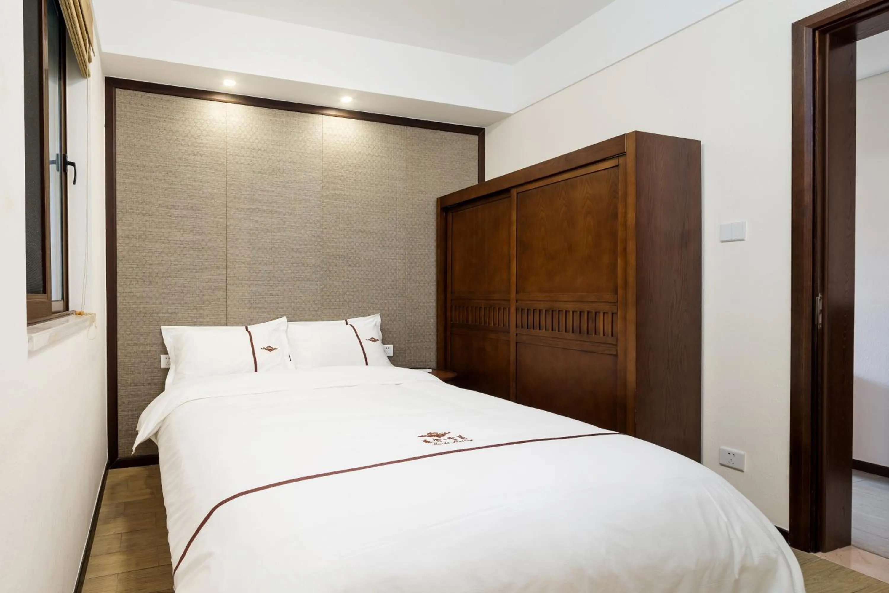 Bed in Sanya Haitang Bay Mushe Villa