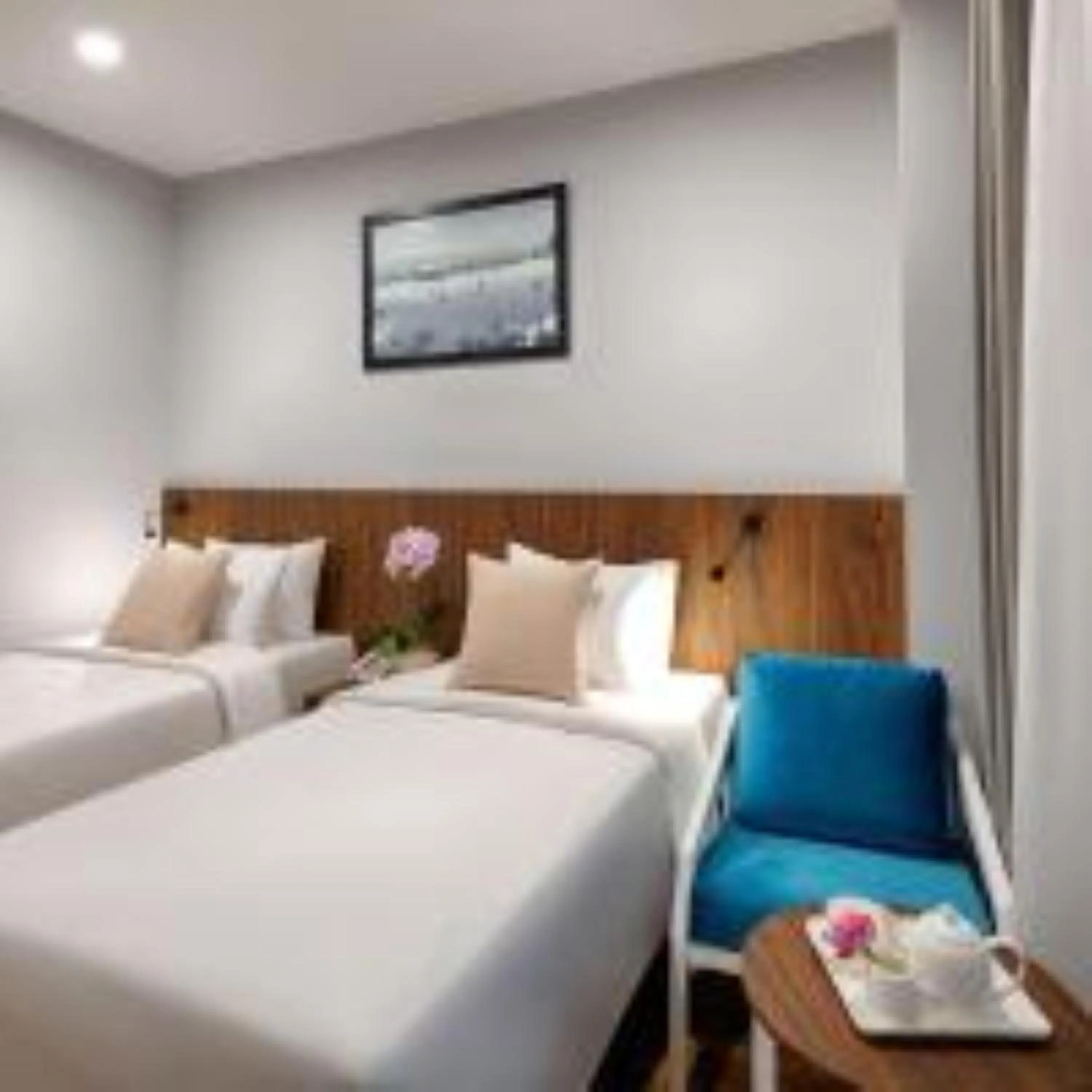 Bed in Happy Life Grand Hotel & Rooftop Skybar