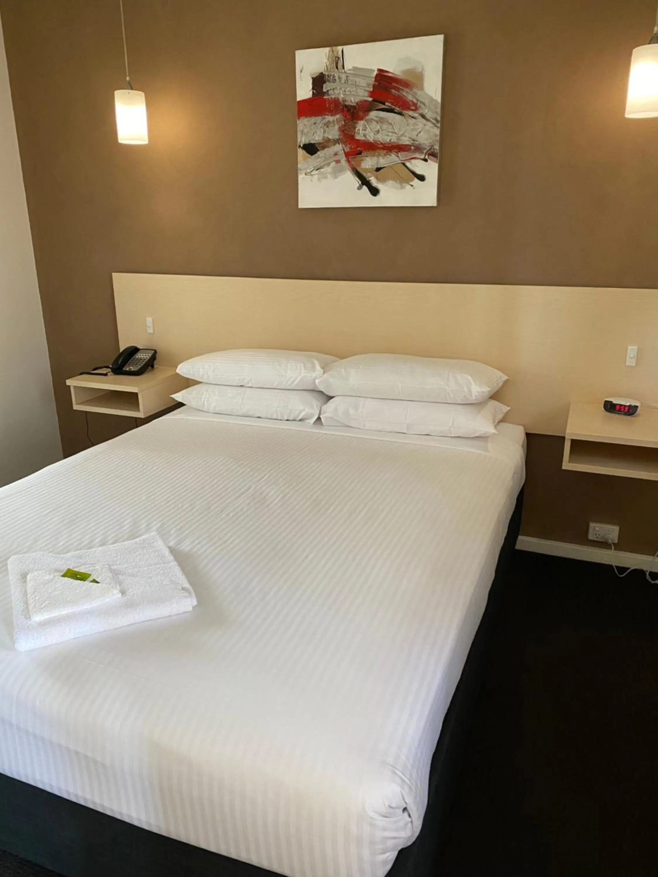 Bed in Adelaide Airport Motel