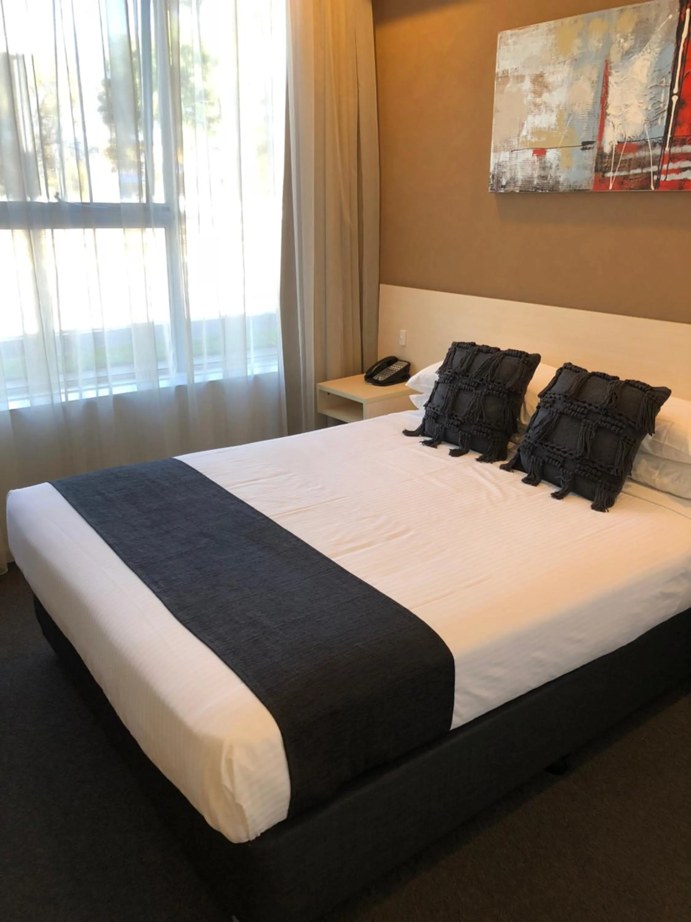 Bed in Adelaide Airport Motel