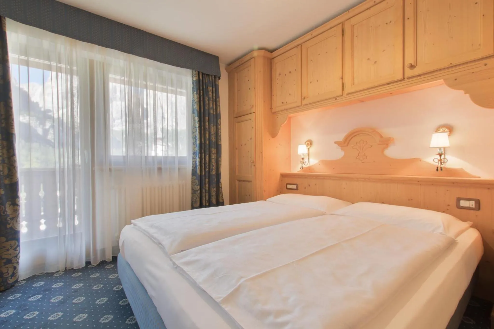 Bed in Garnì La Dorada