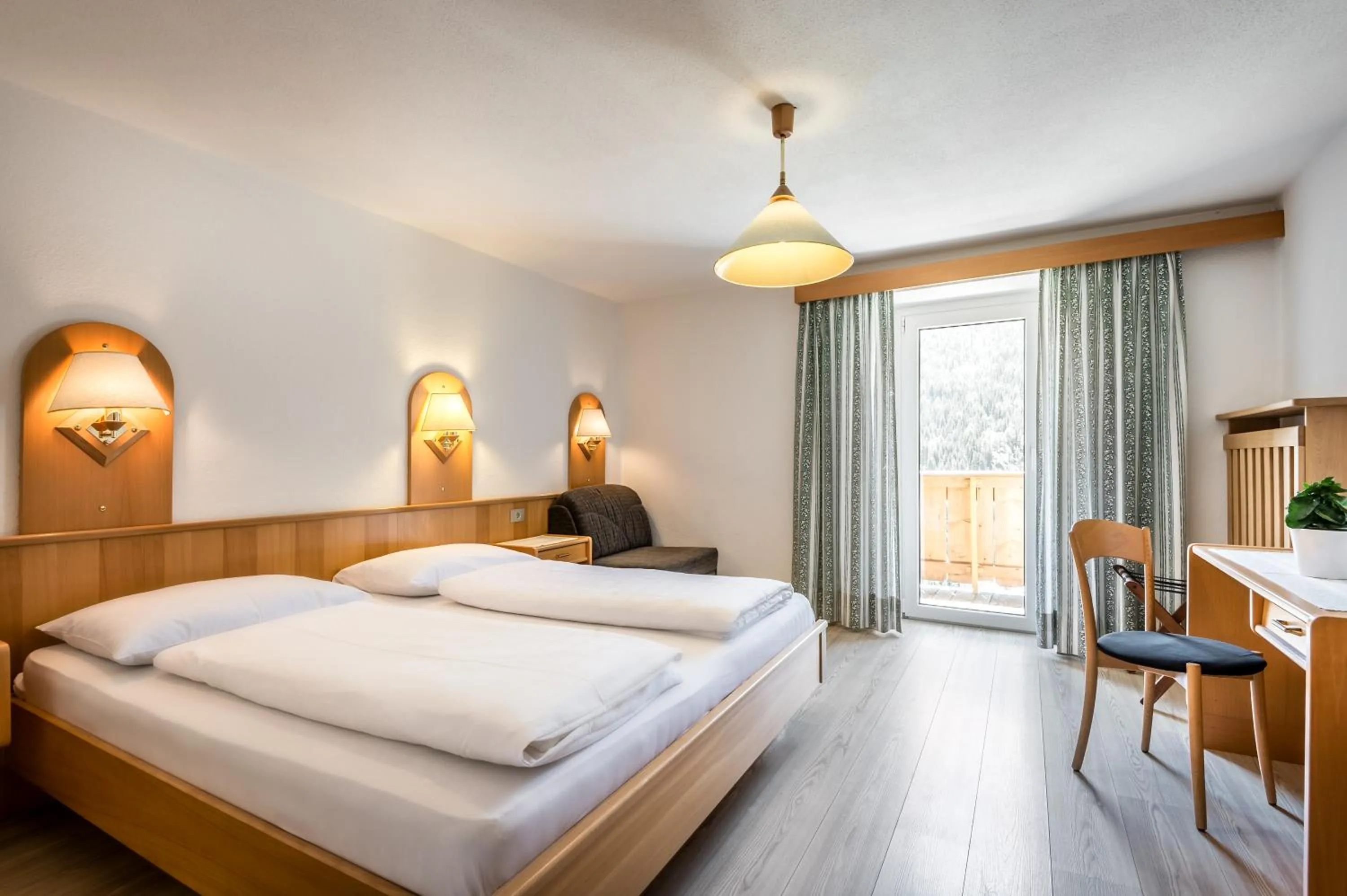 Bed in Pensione Vittoria