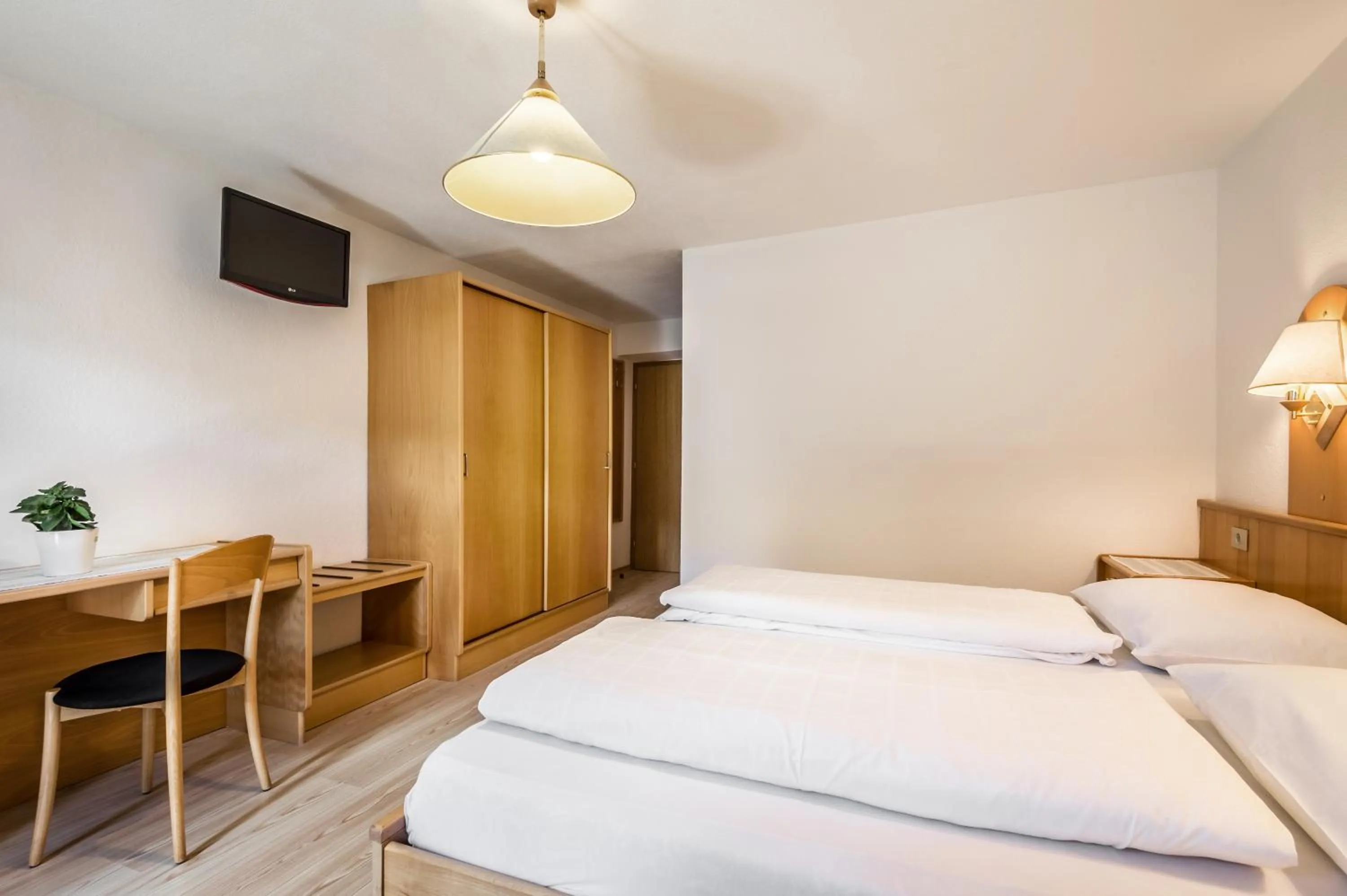 Bed in Pensione Vittoria