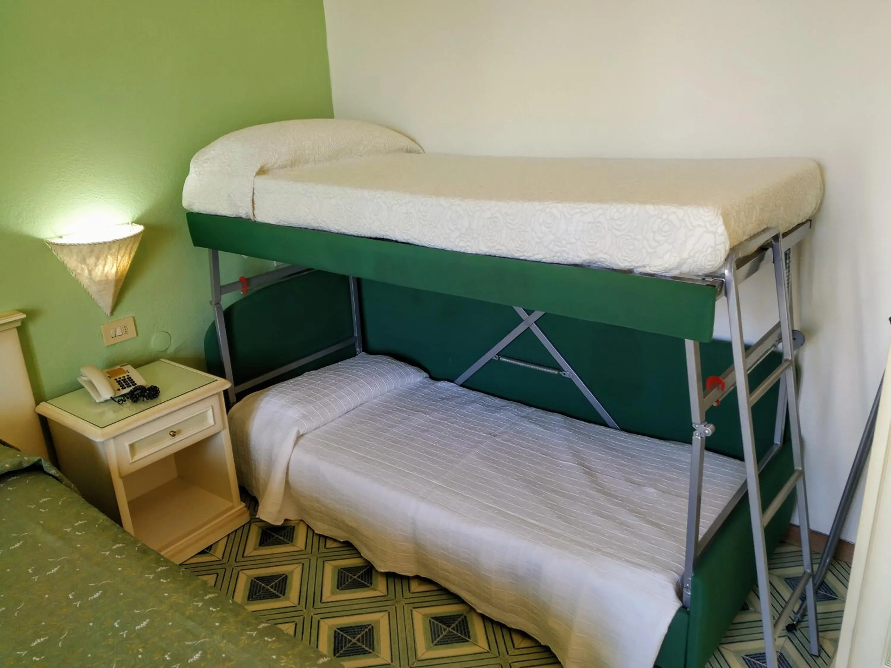 Bed in Hotel La Scogliera