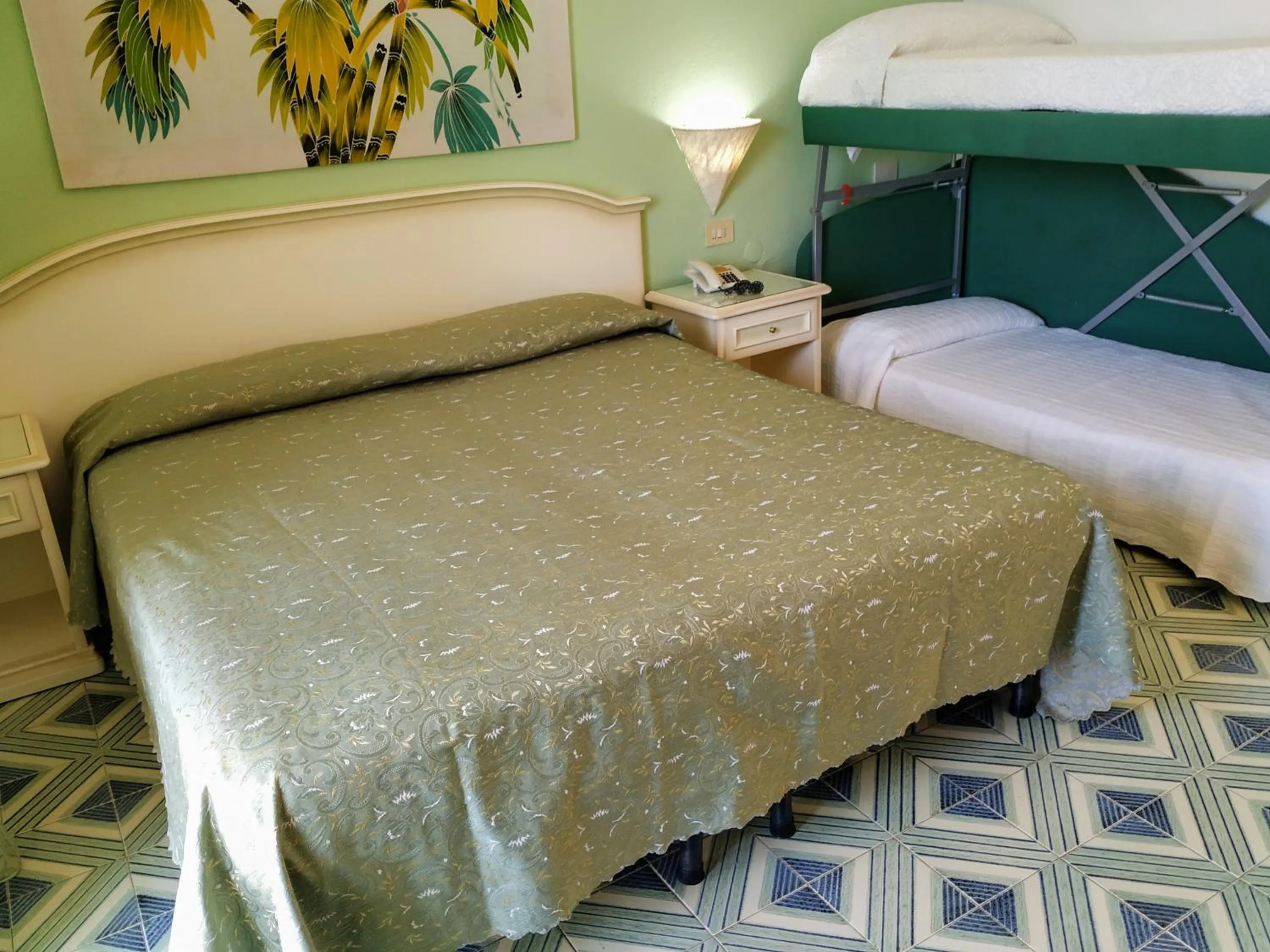 Bed in Hotel La Scogliera