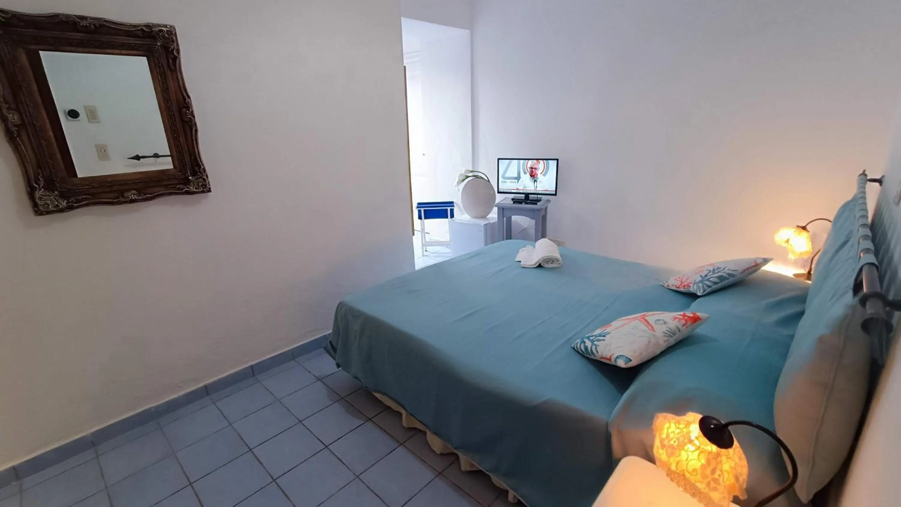 Bed in Hotel La Scogliera