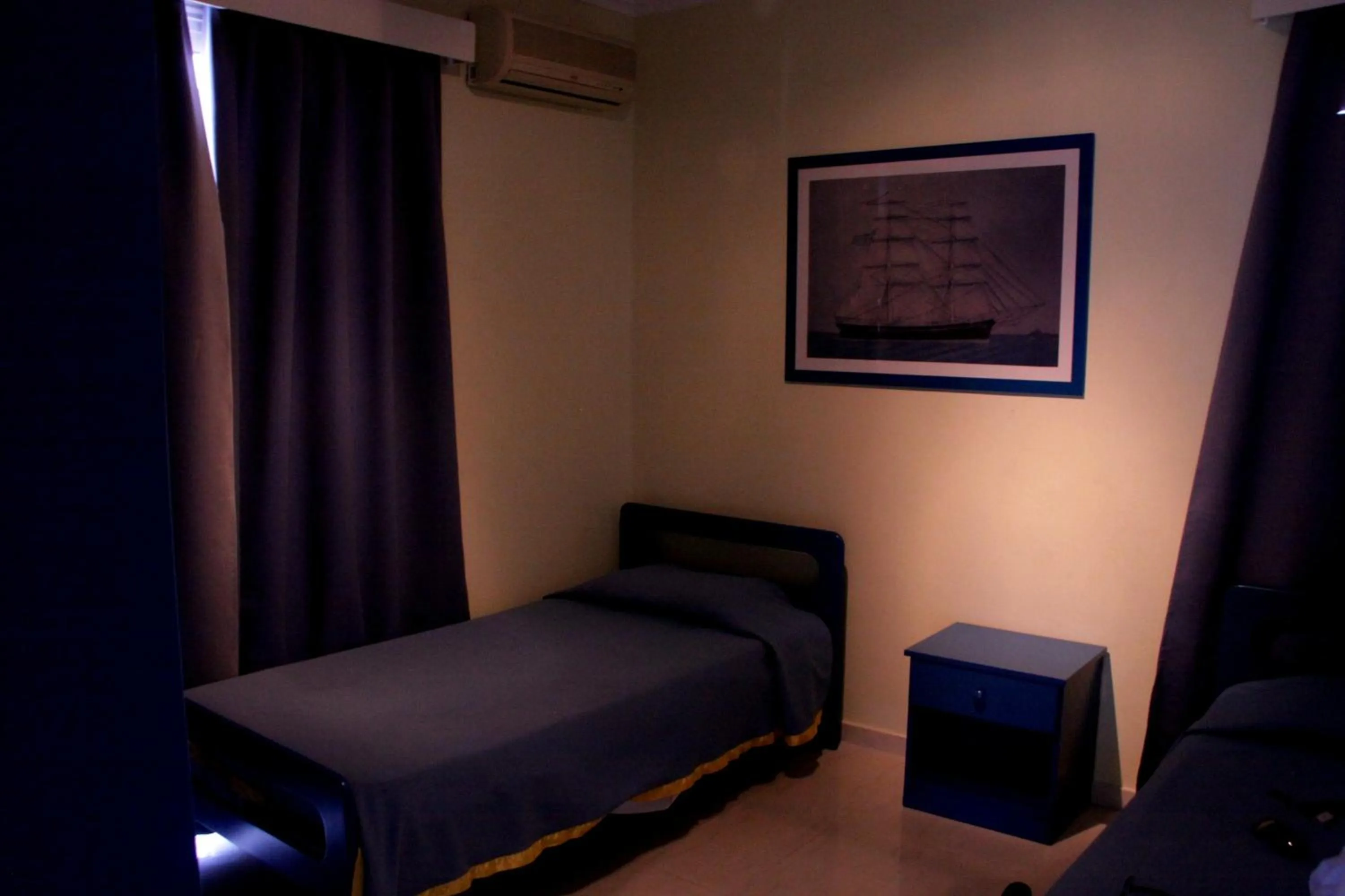 Bed in Paphinia SeaView Apartments