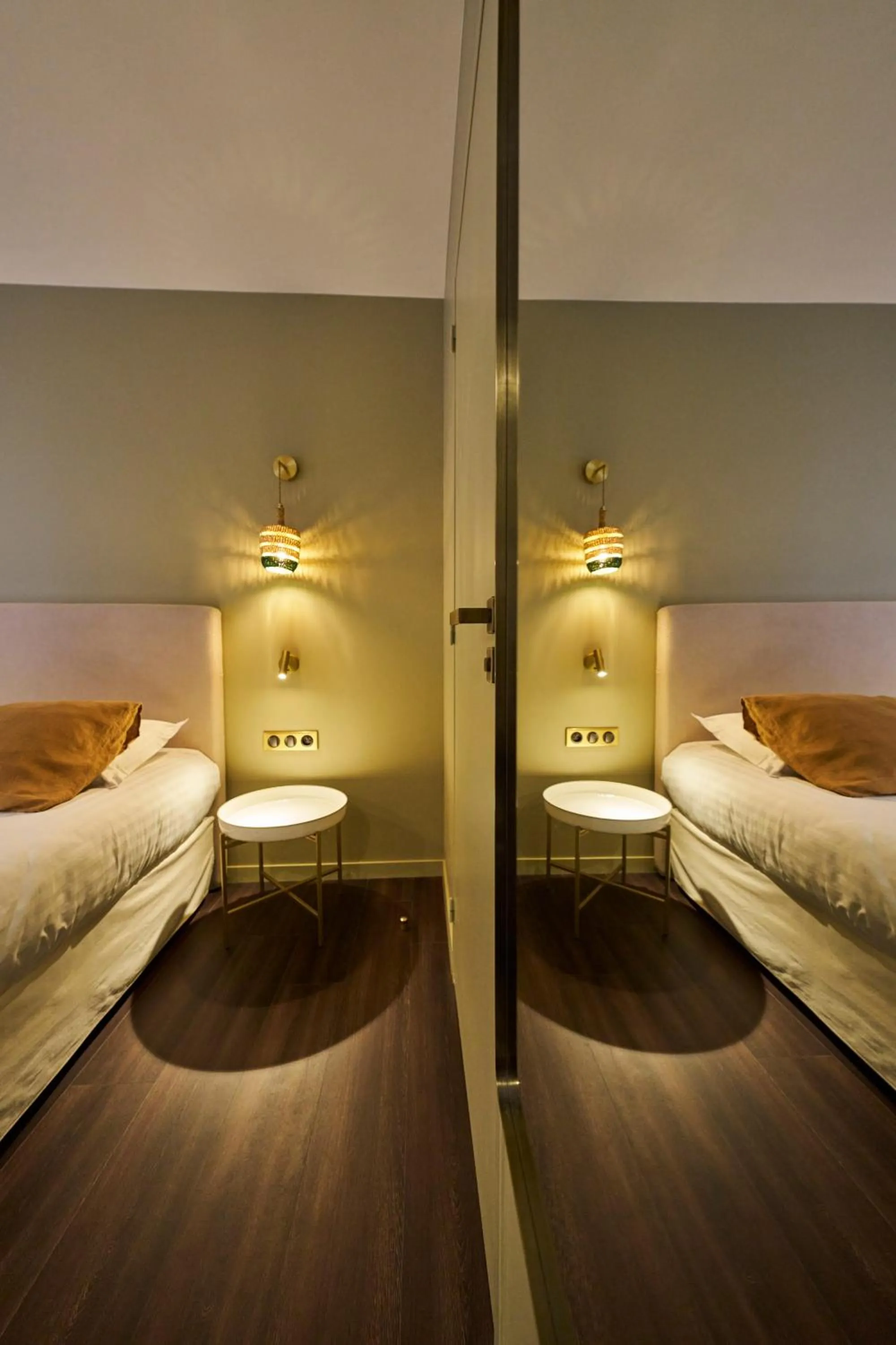 Decorative detail, Bed in Hôtel le Corbusson Laval Ouest