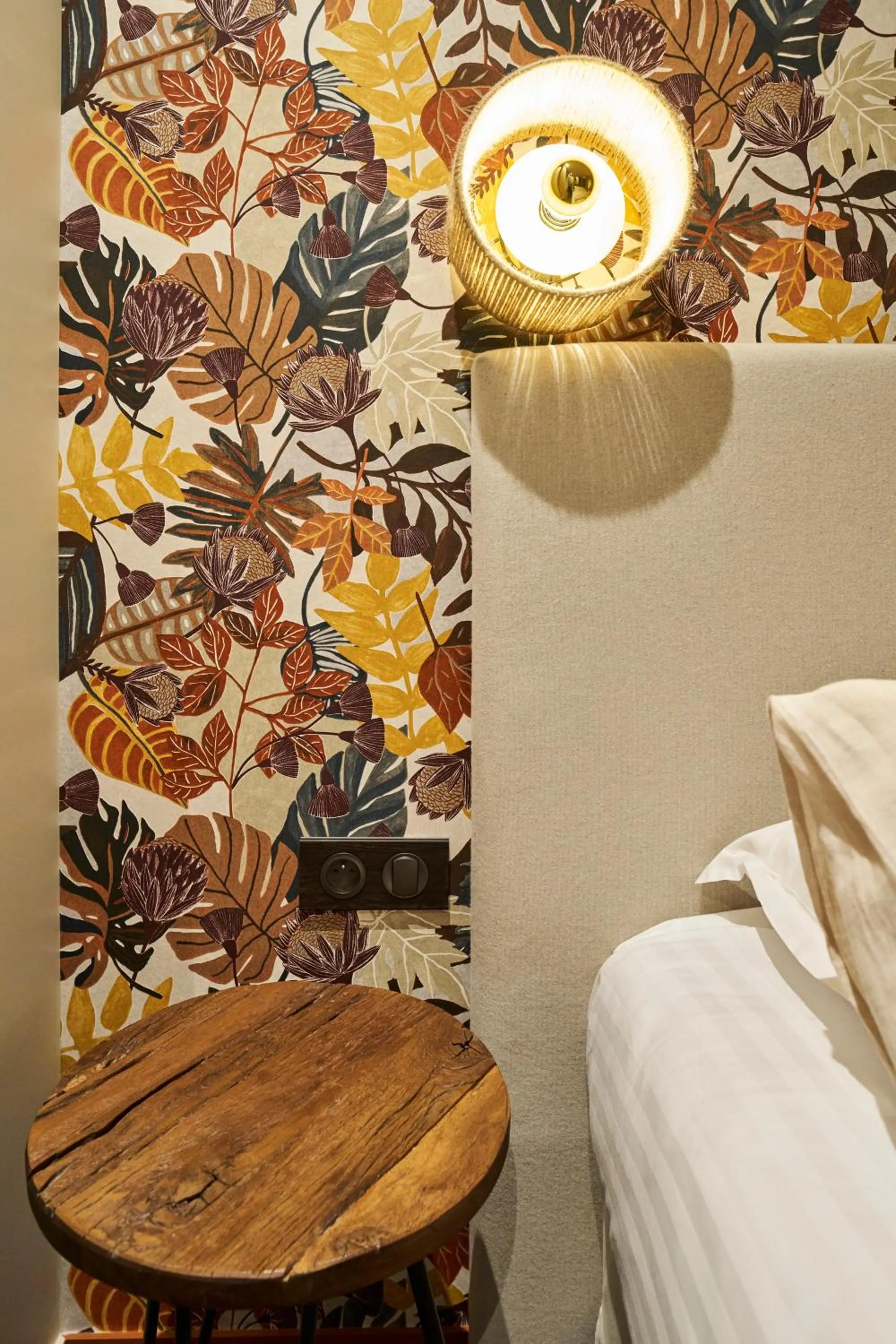 Decorative detail, Bed in Hôtel le Corbusson Laval Ouest