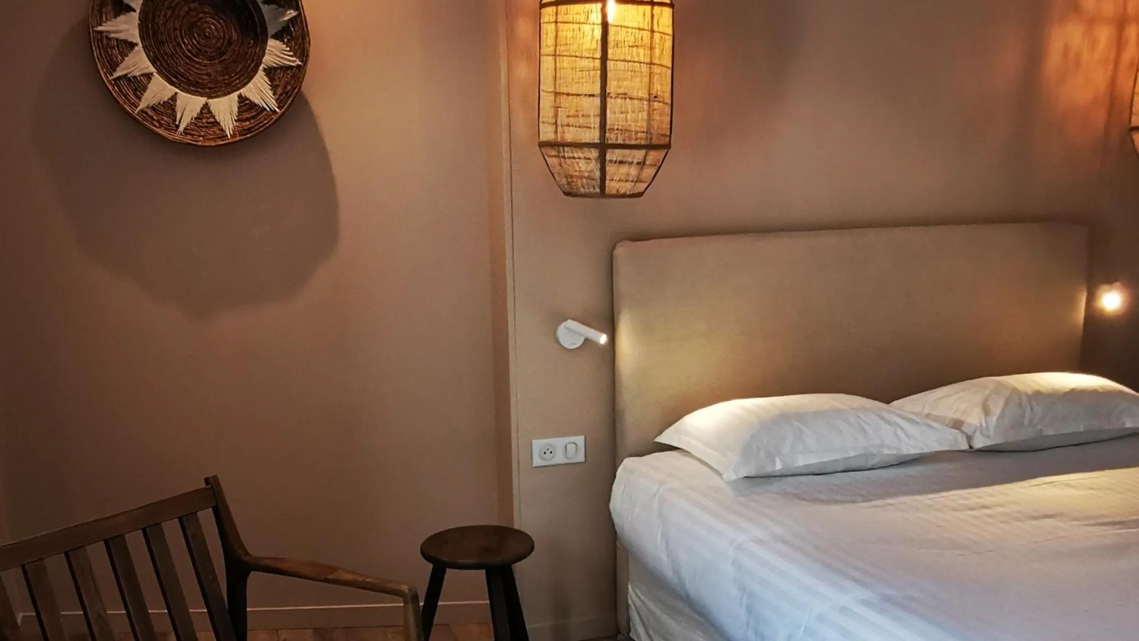 Bed in Hôtel le Corbusson