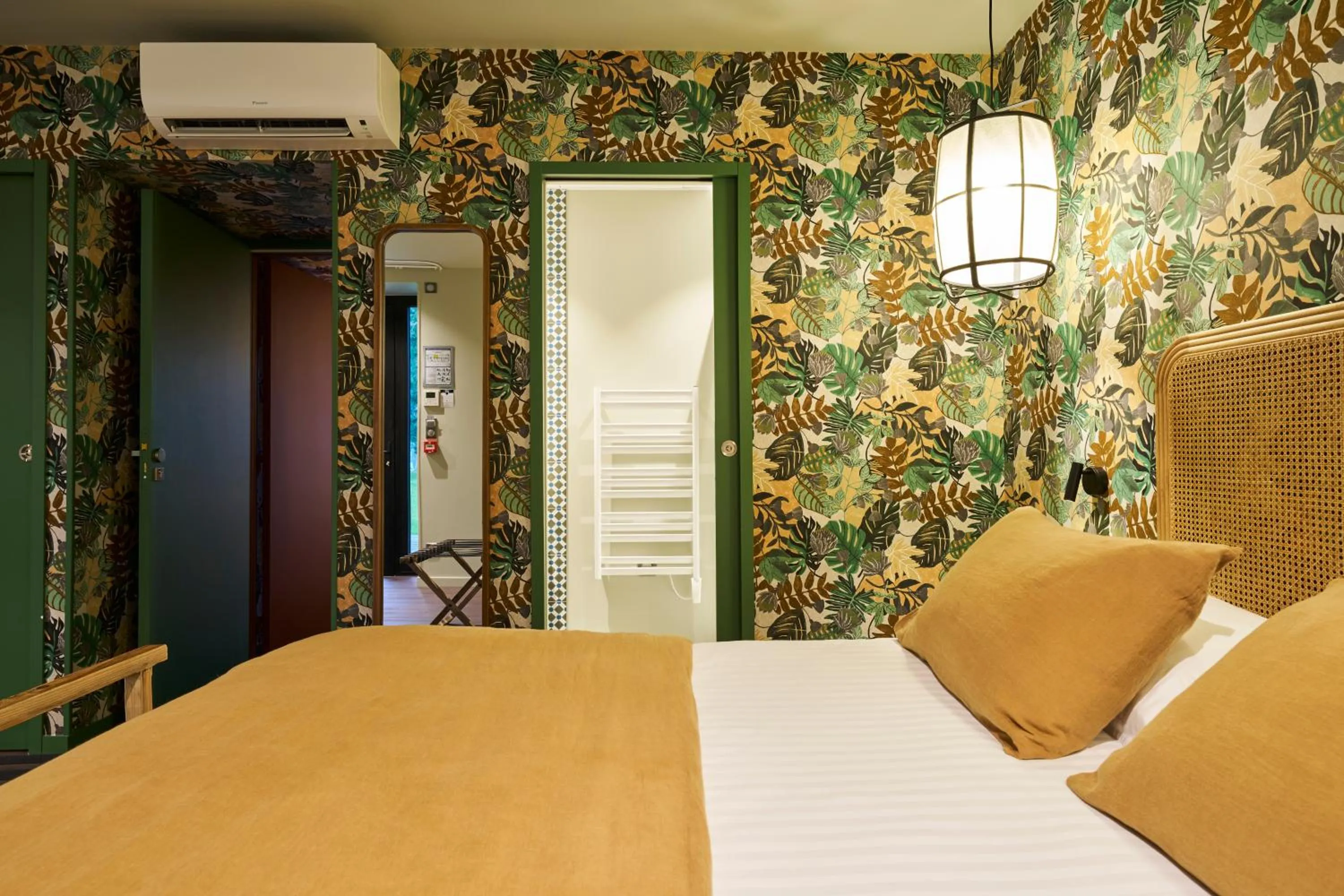 Photo of the whole room, Bed in Hôtel le Corbusson Laval Ouest