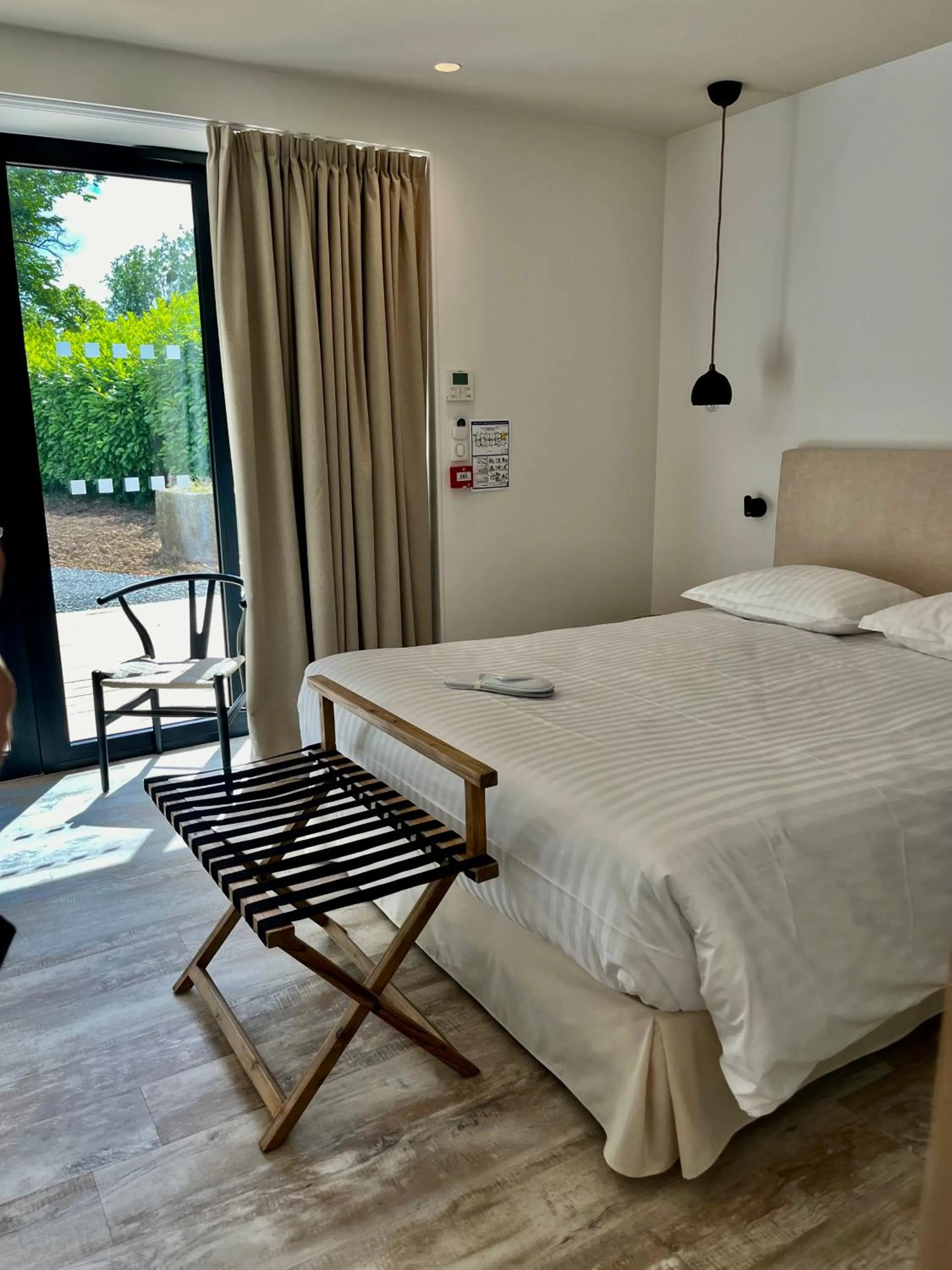 Bed in Hôtel le Corbusson