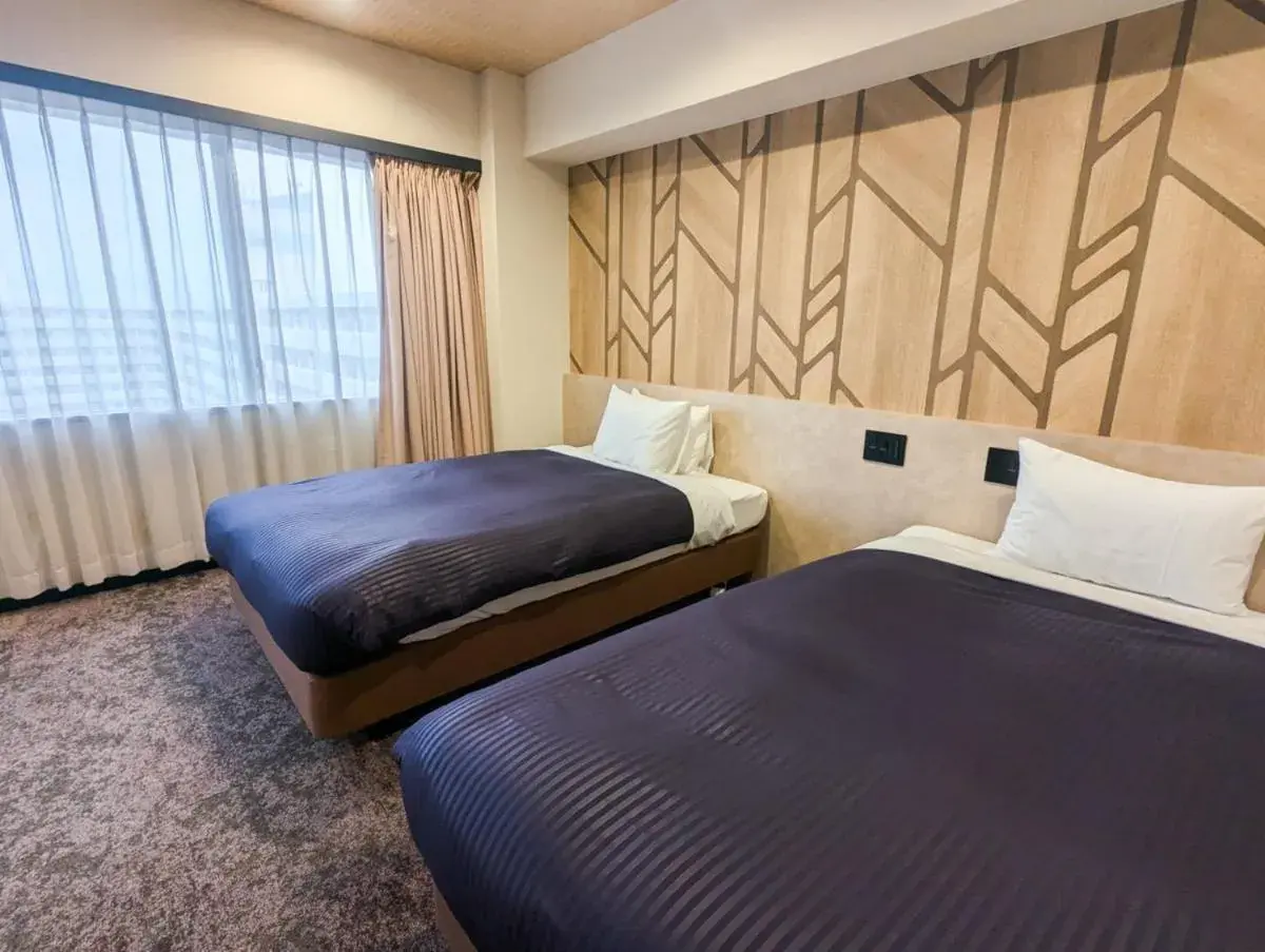 Bed in HOTEL LiVEMAX BUDGET Kagoshima Bed in HOTEL LiVEMAX BUDGET Kagoshima