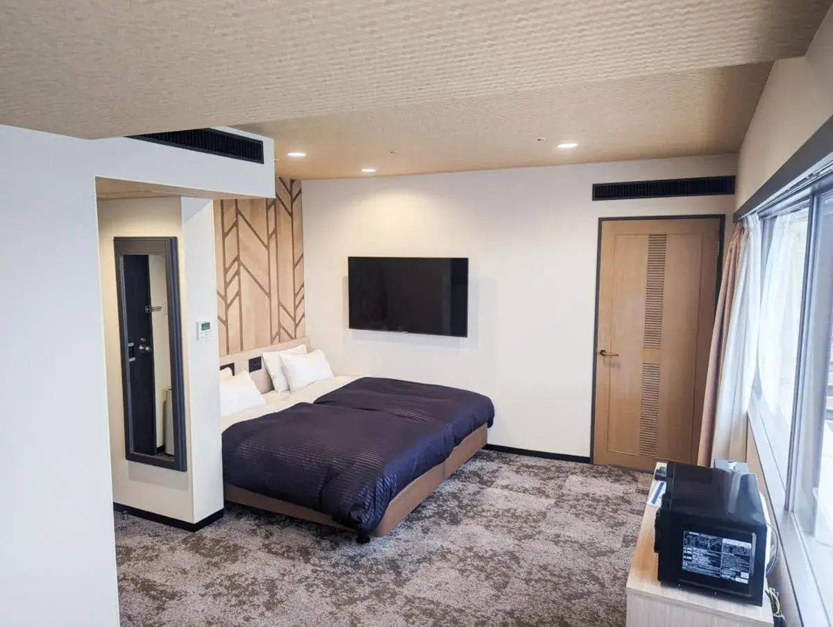 Bed in HOTEL LiVEMAX BUDGET Kagoshima Bed in HOTEL LiVEMAX BUDGET Kagoshima