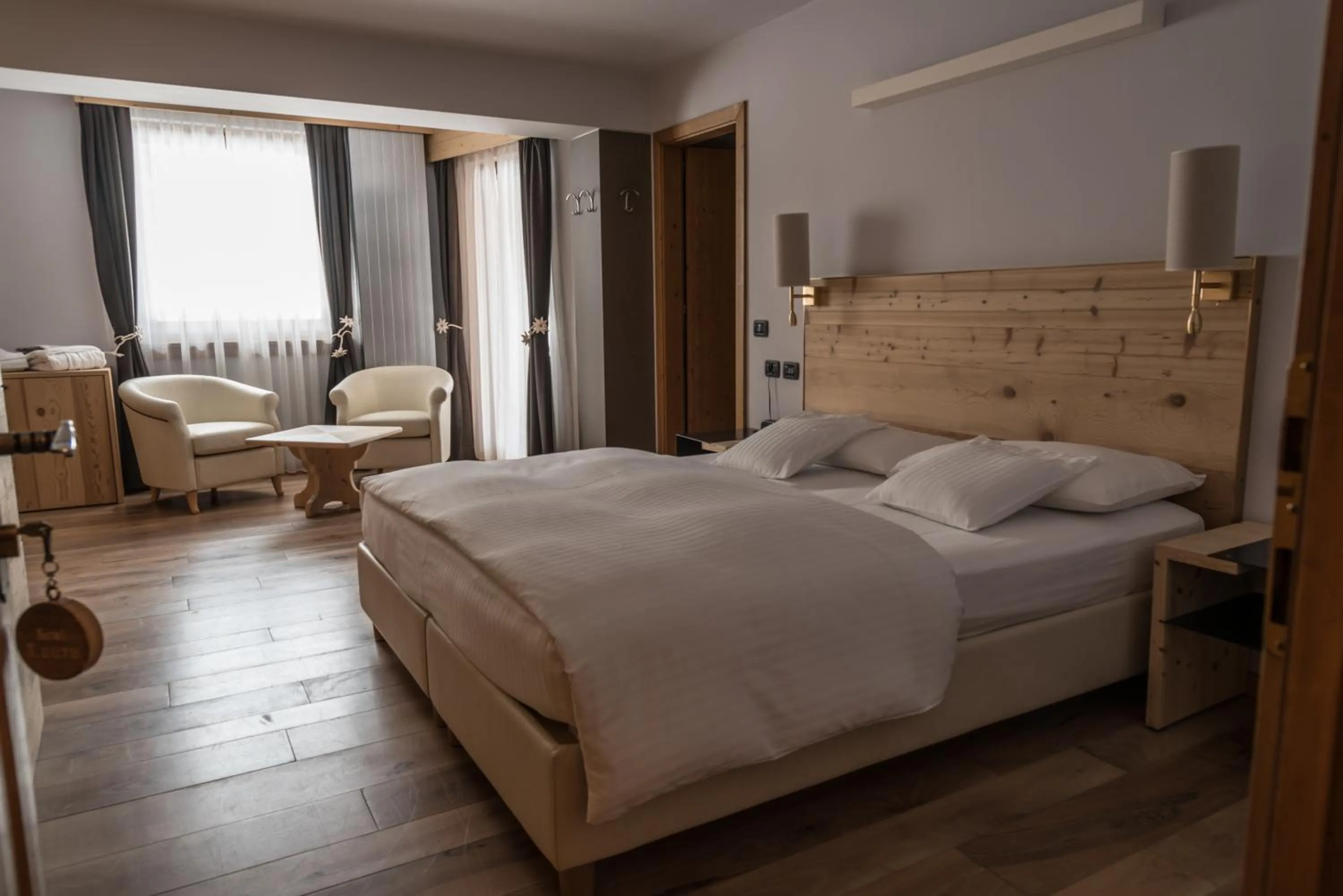 Bed in Chalet Laura Lodge Hotel