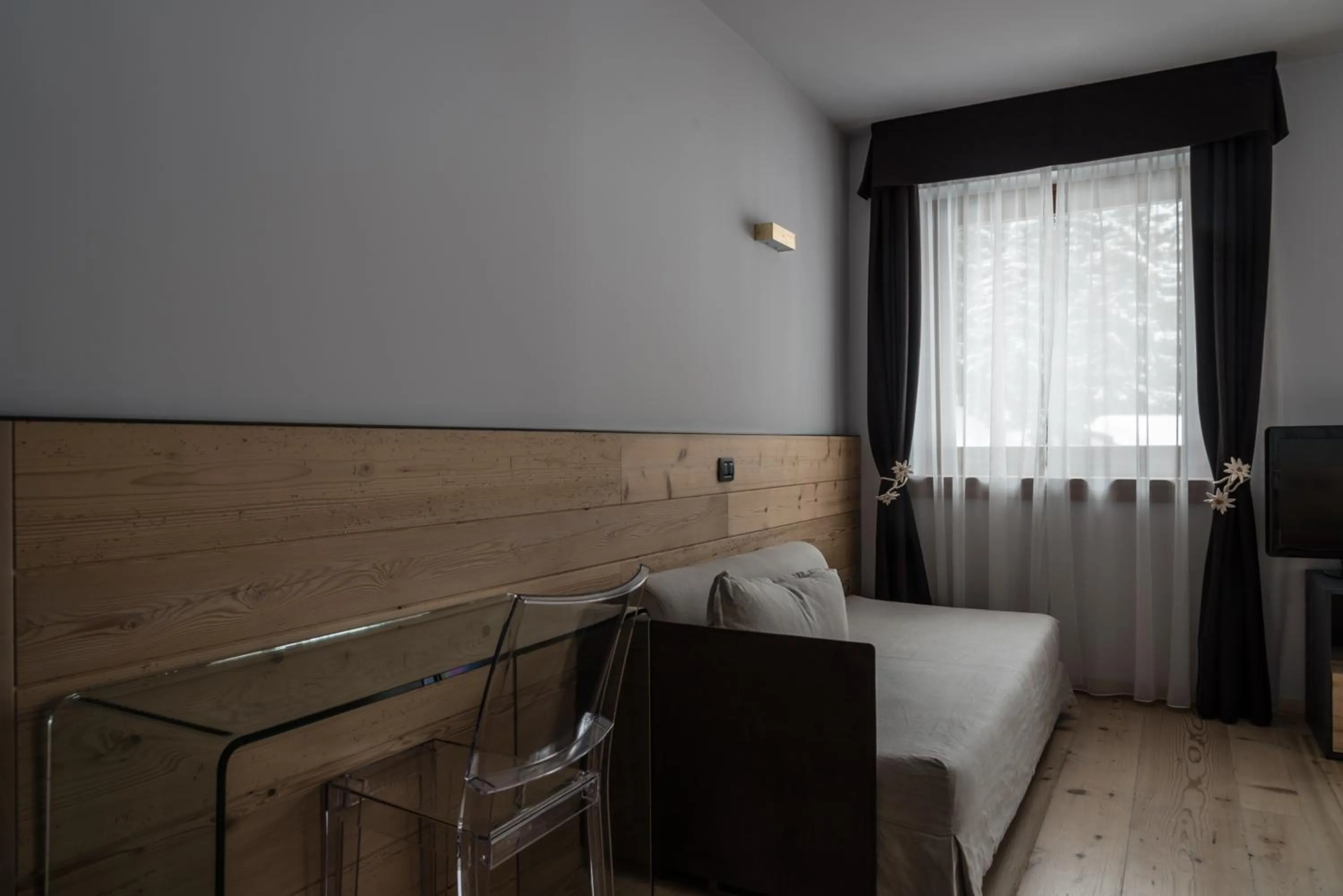 Bed in Chalet Laura Lodge Hotel