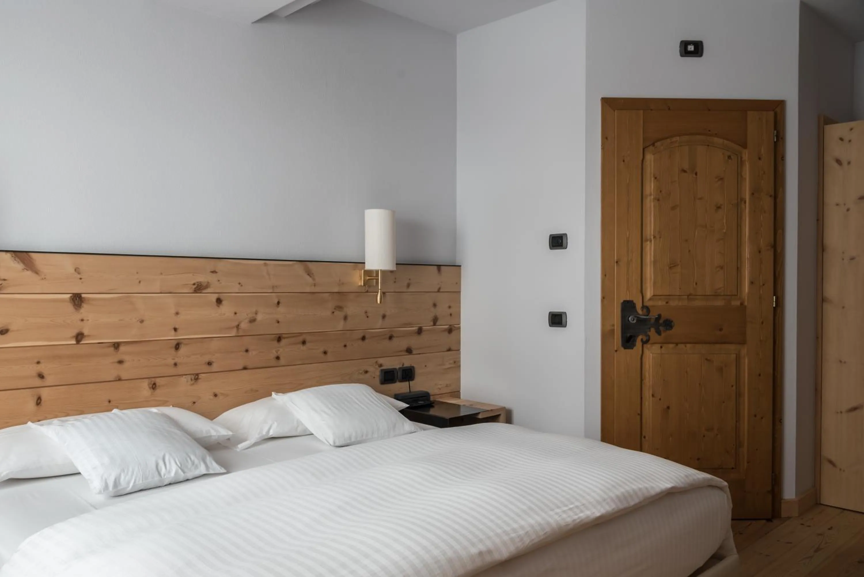 Bed in Chalet Laura Lodge Hotel