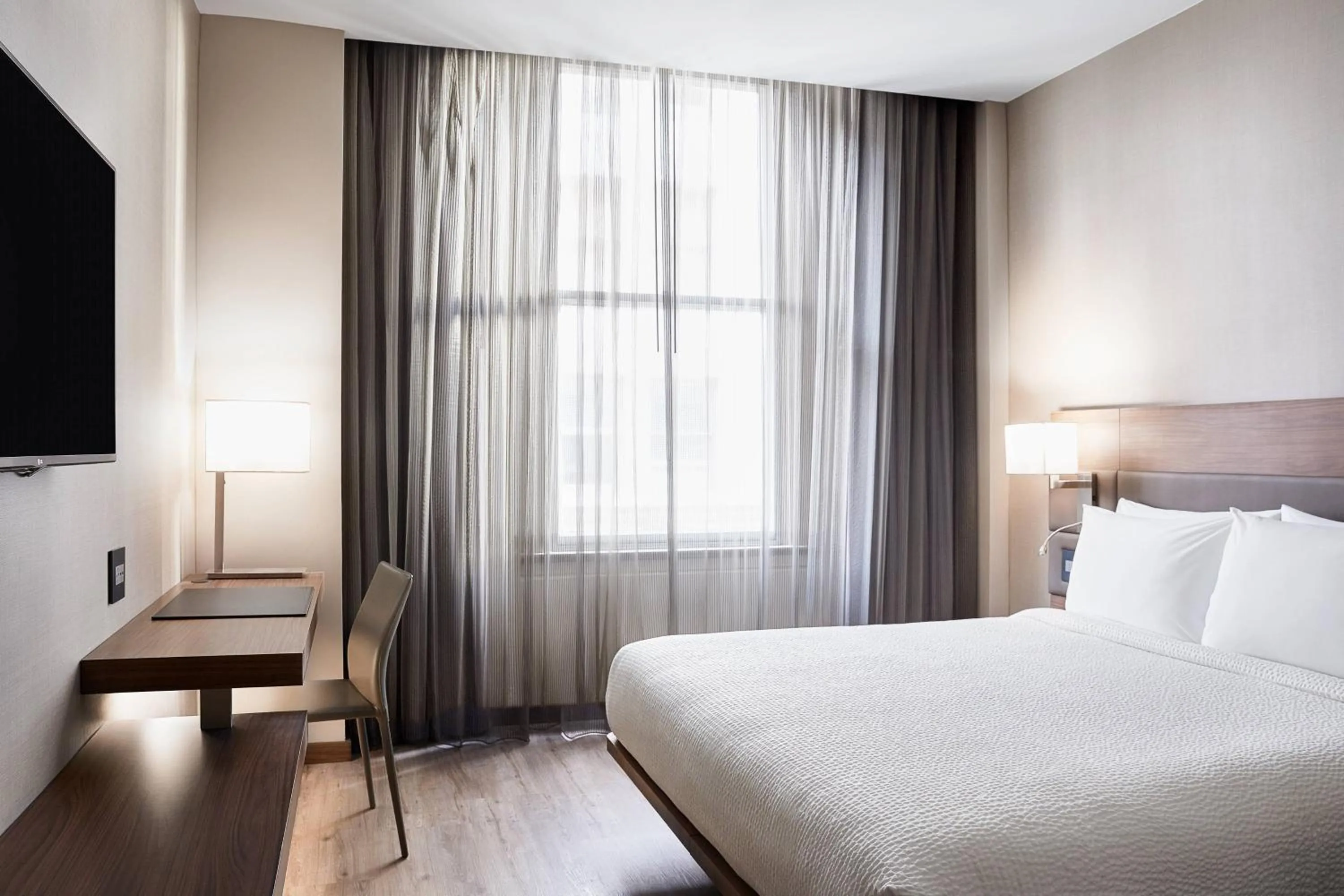 Photo of the whole room, Bed in AC Hotel by Marriott New Orleans French Quarter