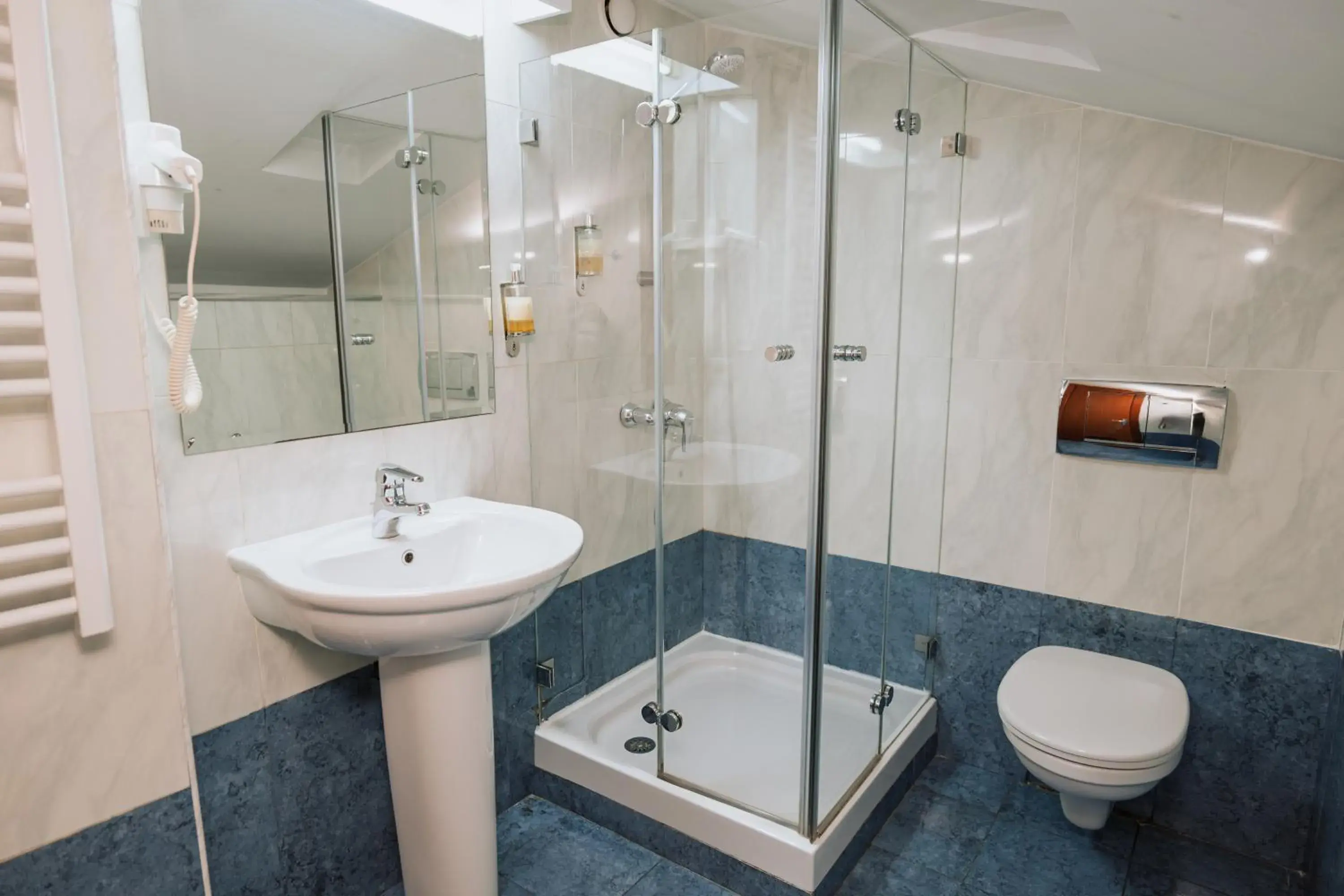 Bathroom in Hotel Duke Romana City Center Bathroom in Hotel Duke Romana City Center