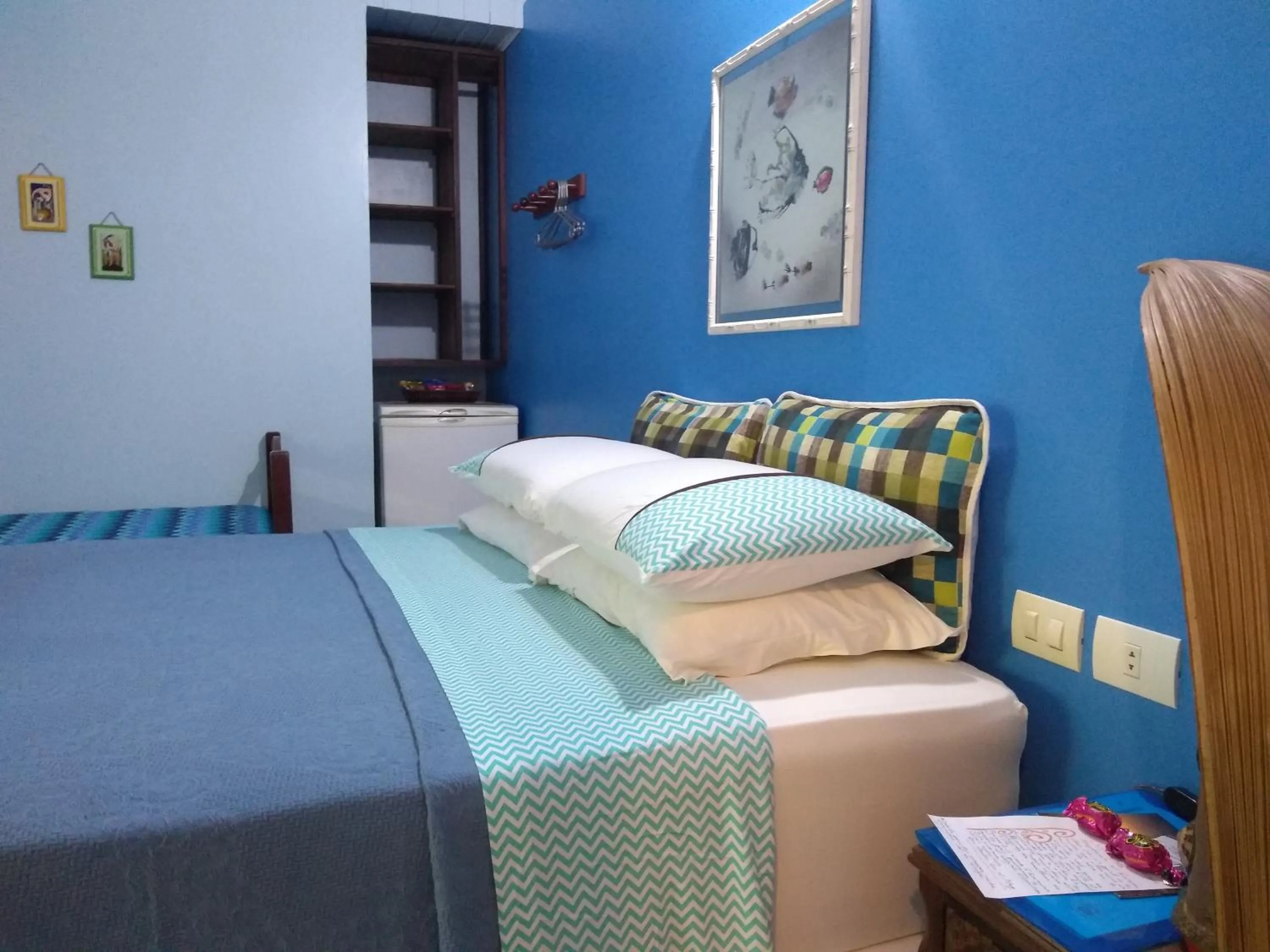 Bed in Pousada Enseada das Conchas